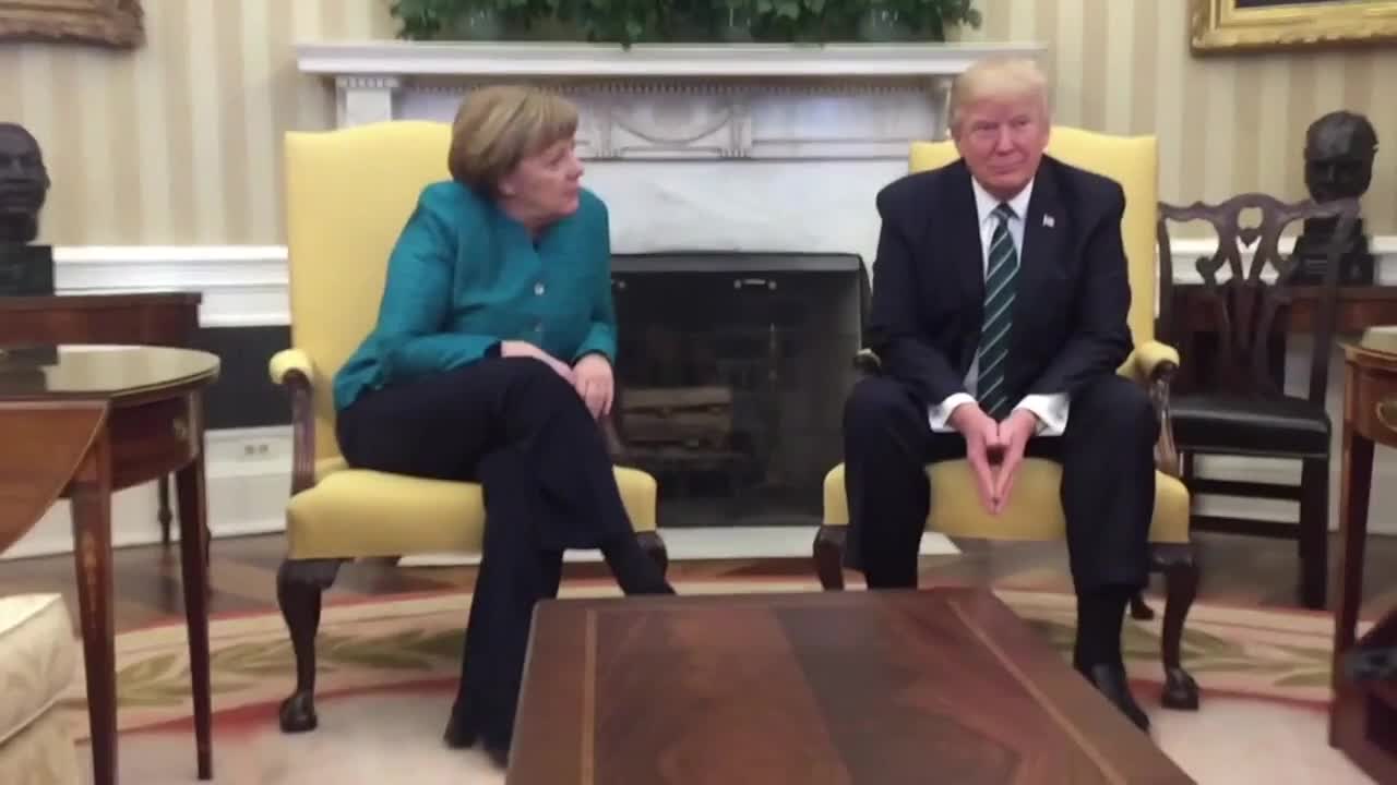 Donald Trump refuses to shake Angela Merkel's hand