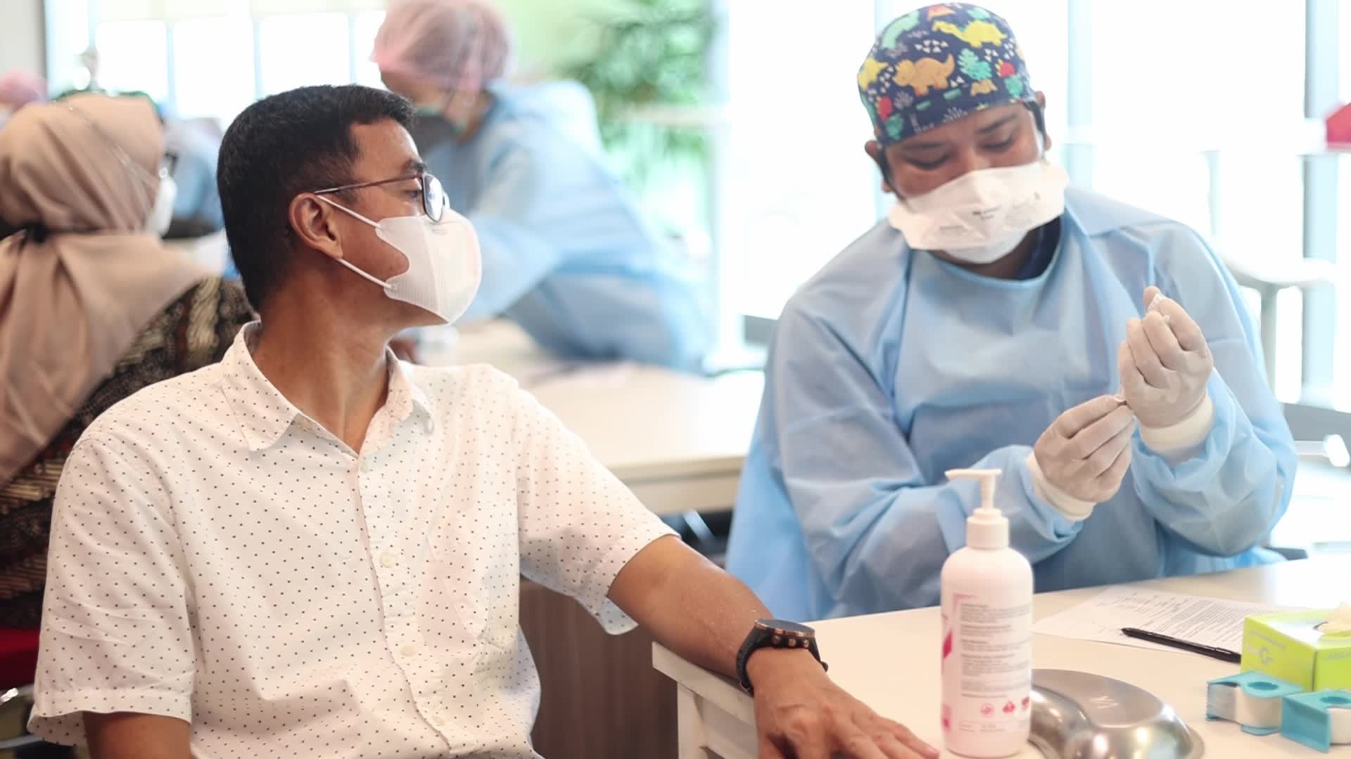 Booster Covid-19 Vaccine Rollout in Jakarta, Indonesia