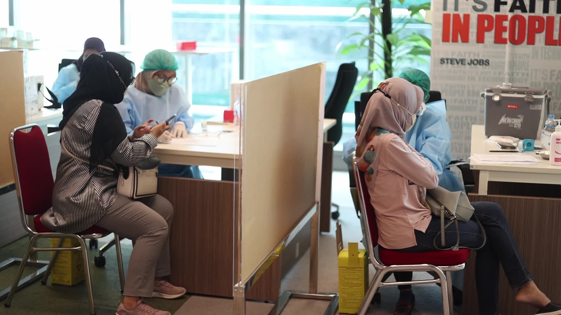 Booster Covid-19 Vaccine Rollout in Jakarta, Indonesia