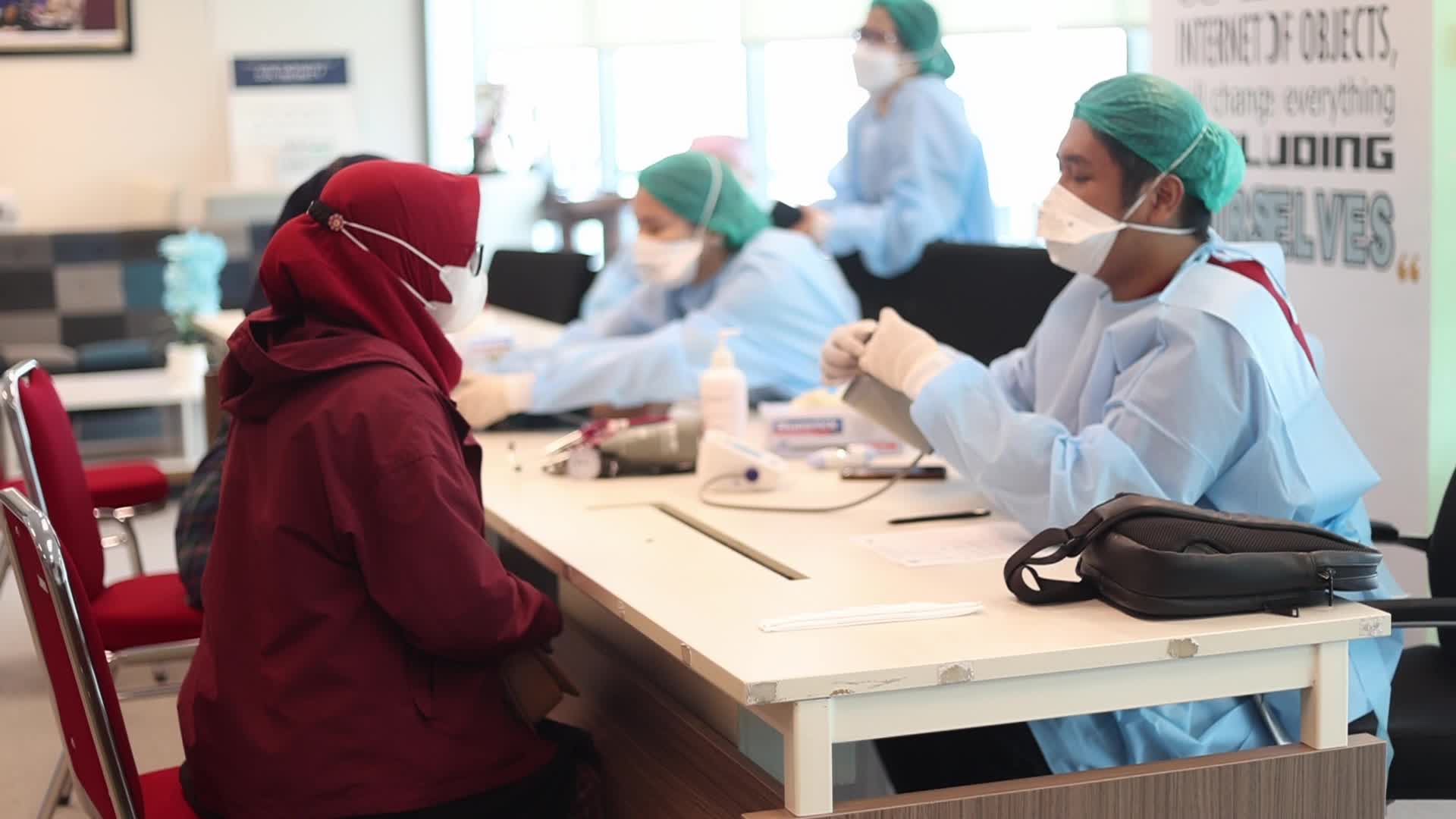 Booster Covid-19 Vaccine Rollout in Jakarta, Indonesia