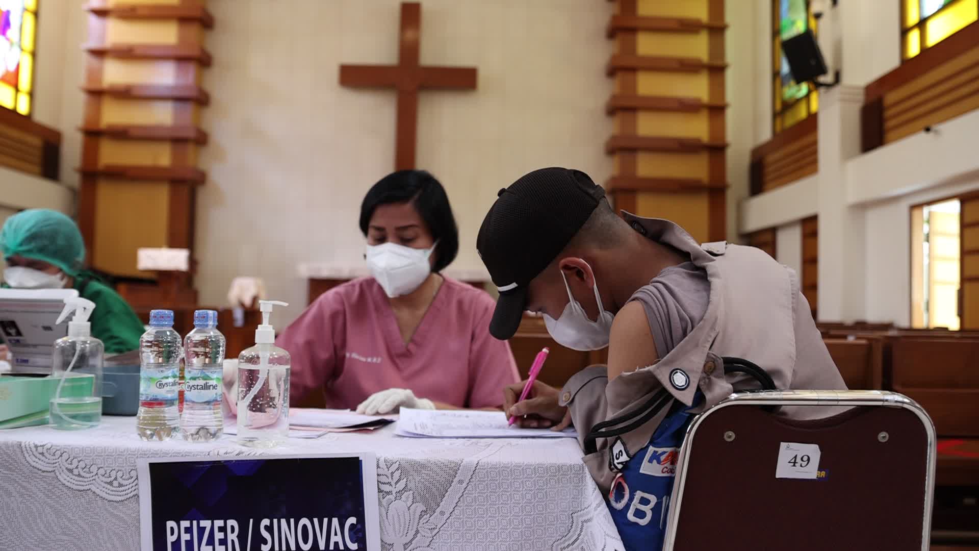 Jakarta Residents Receive COVID-19 Booster Dose At A Chistian Church