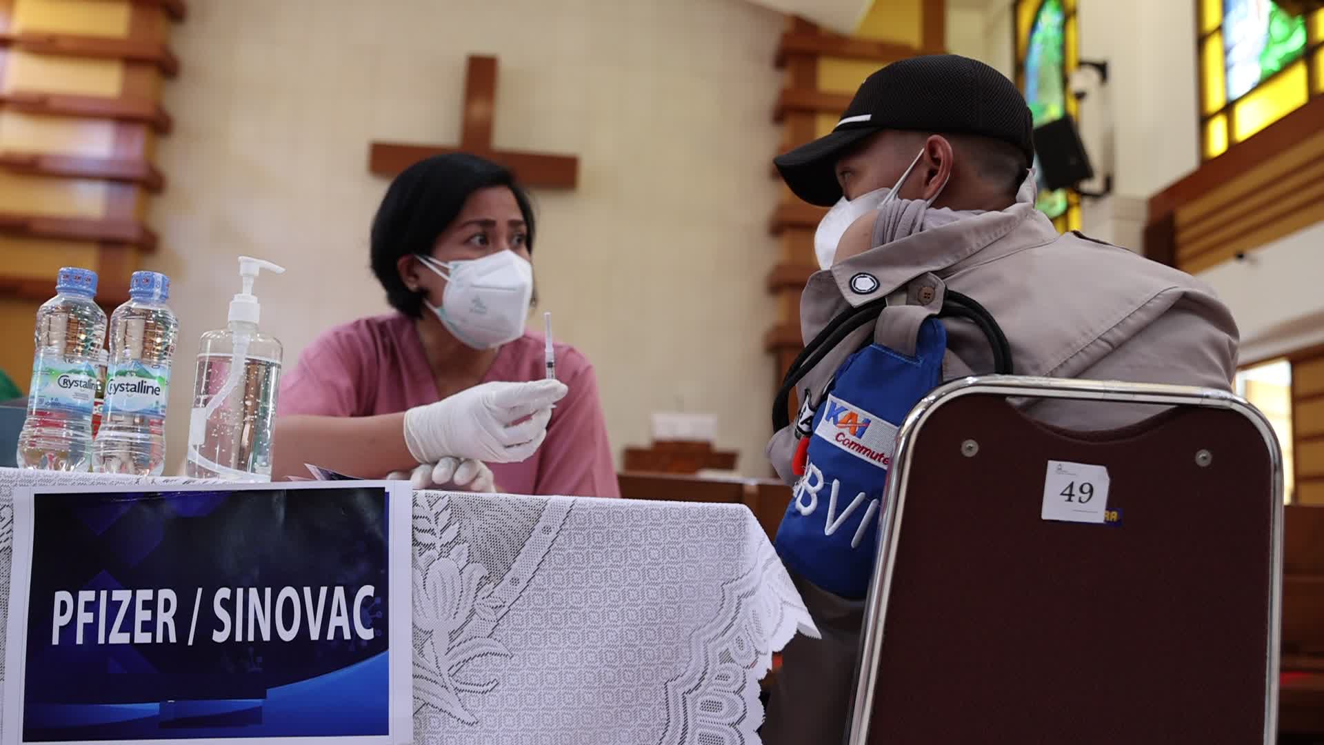 Jakarta Residents Receive COVID-19 Booster Dose At A Chistian Church