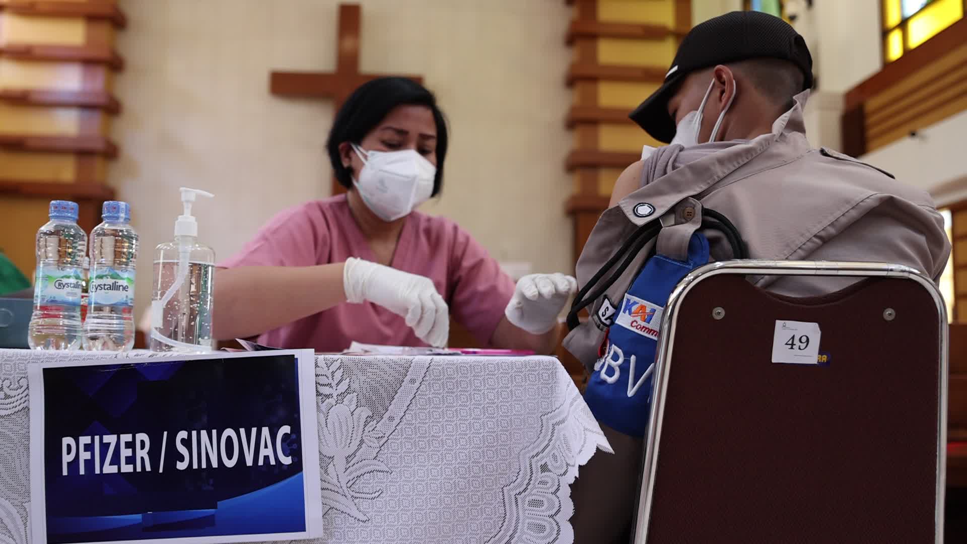 Jakarta Residents Receive COVID-19 Booster Dose At A Chistian Church