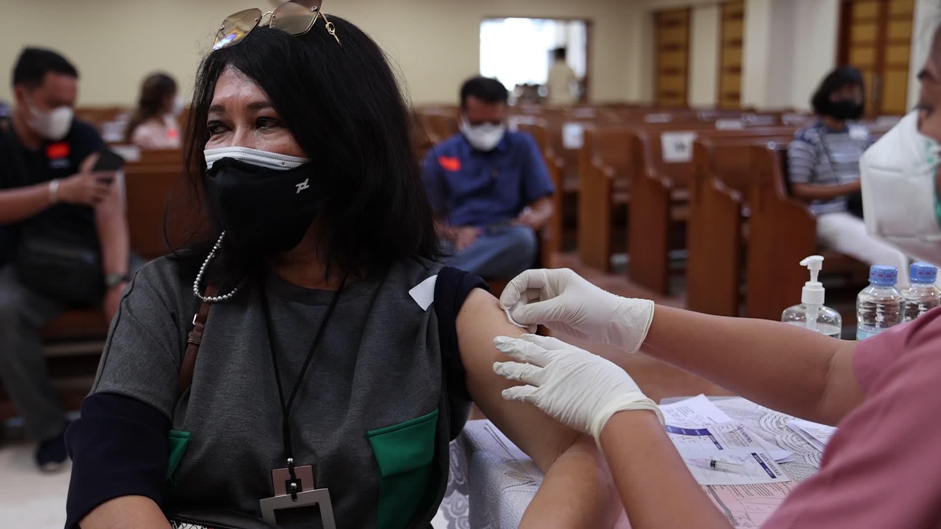 Jakarta Residents Receive COVID-19 Booster Dose At A Chistian Church