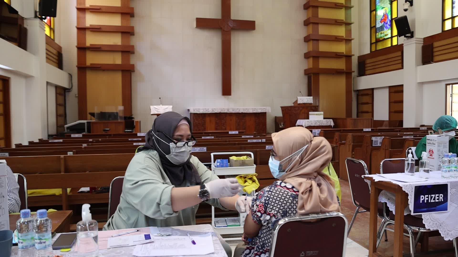 Jakarta Residents Receive COVID-19 Booster Dose At A Chistian Church
