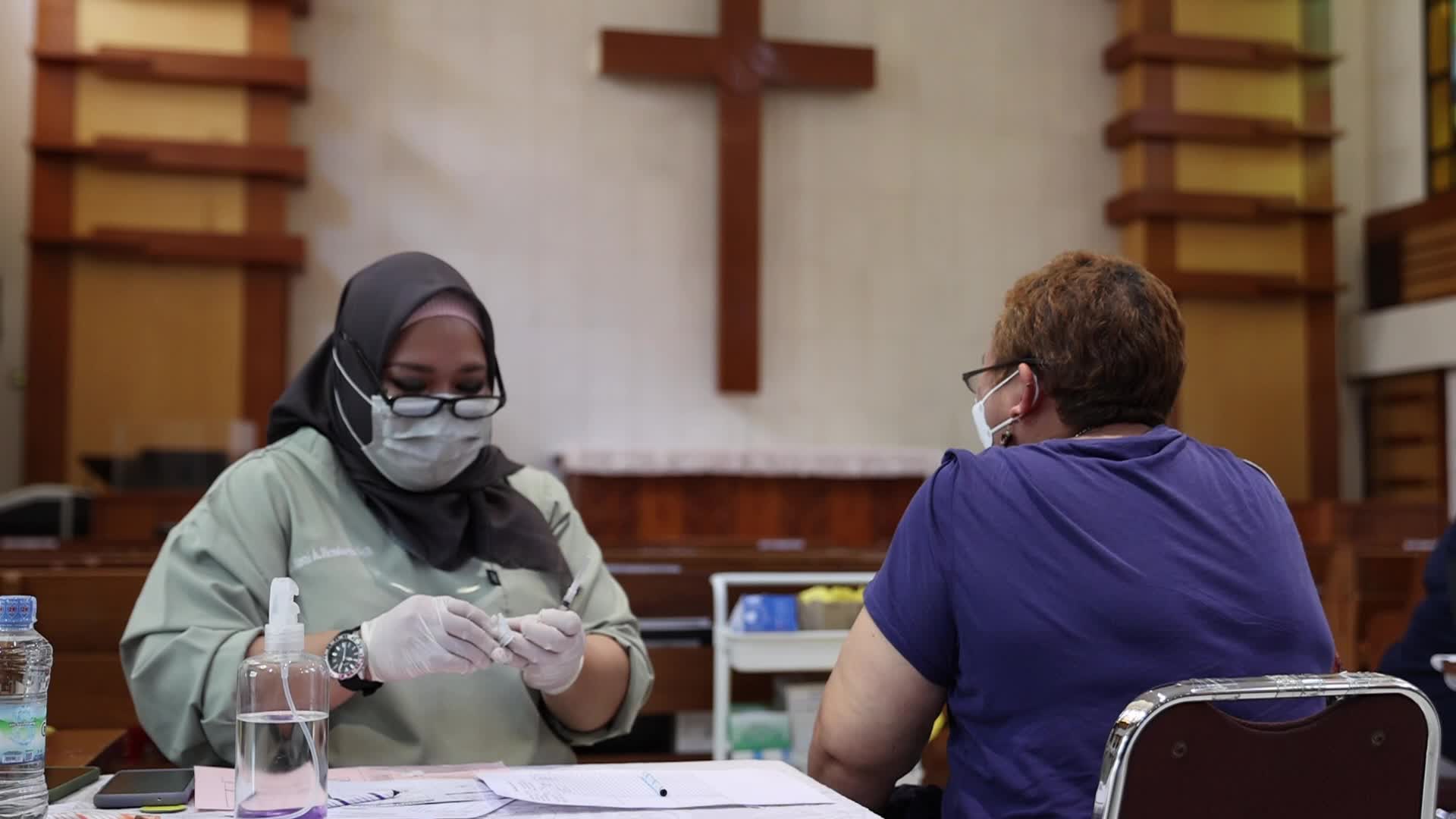 Jakarta Residents Receive COVID-19 Booster Dose At A Chistian Church