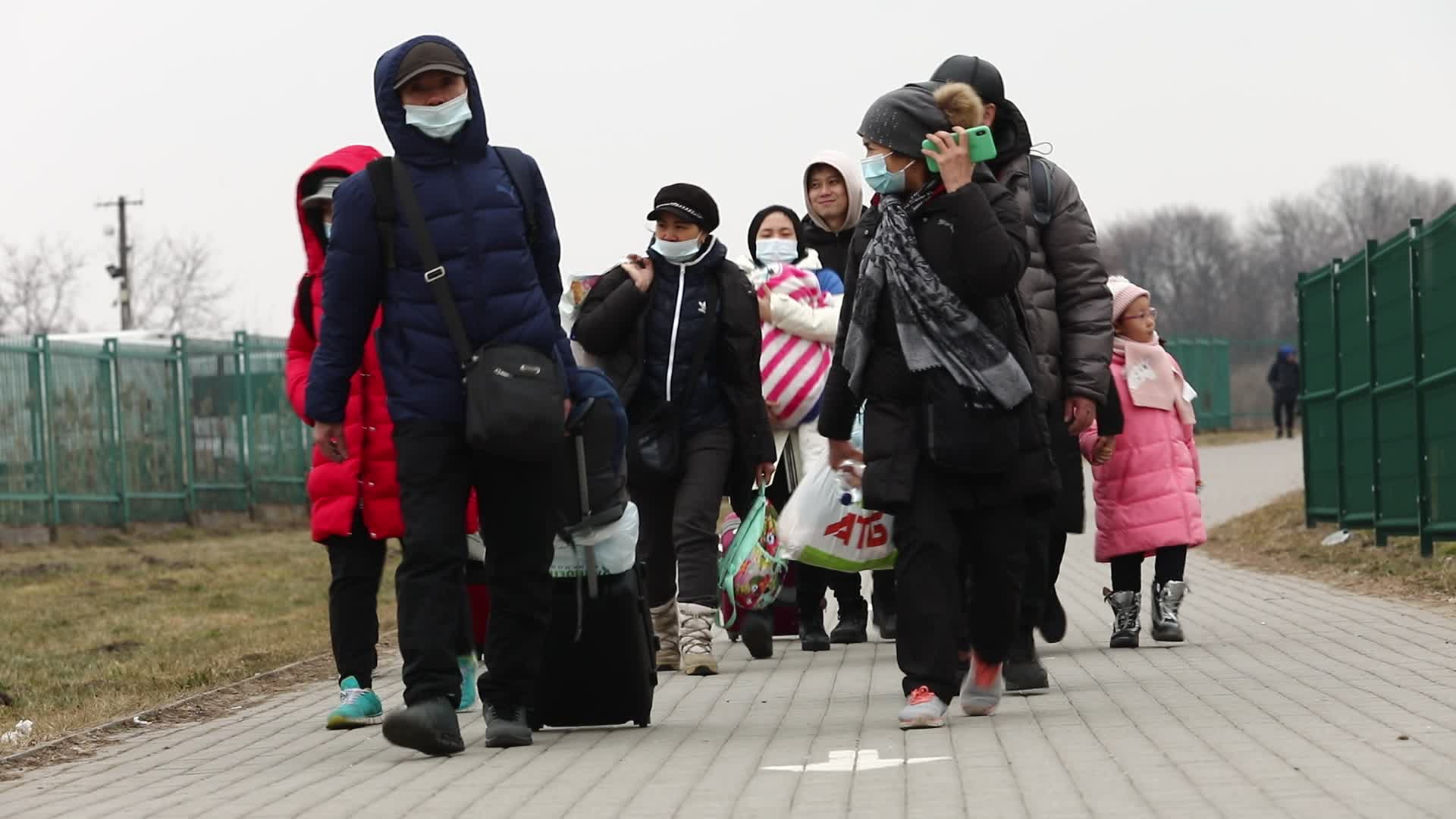 Refugees Cross The Ukrainian-Polish Border