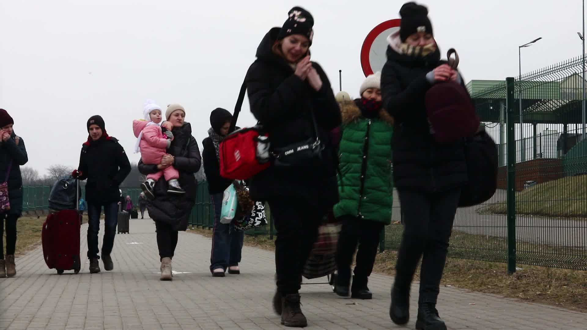 Refugees Cross The Ukrainian-Polish Border