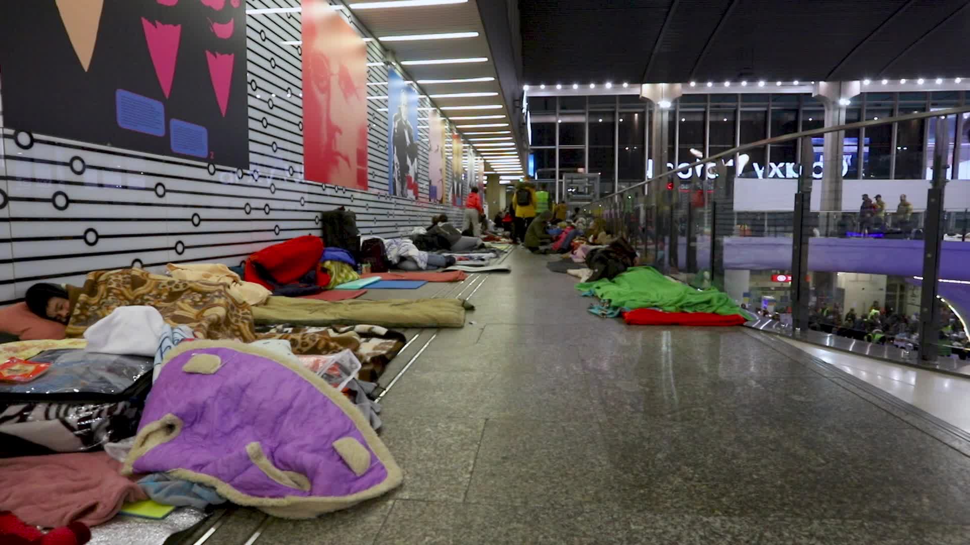 Refugees from Ukraine camp at the Warsaw Central Railway Station