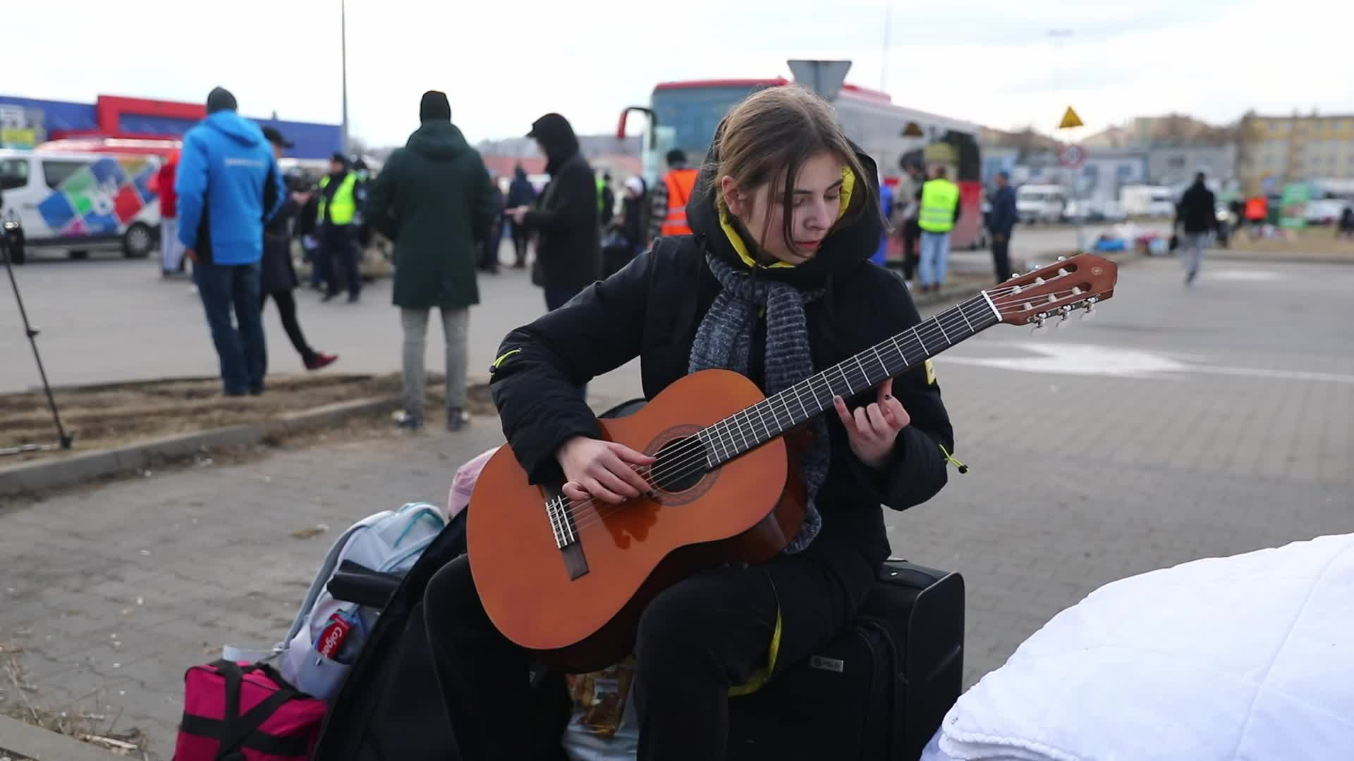 People Cross Ukrainian-Polish Border After Fleeing Ukraine