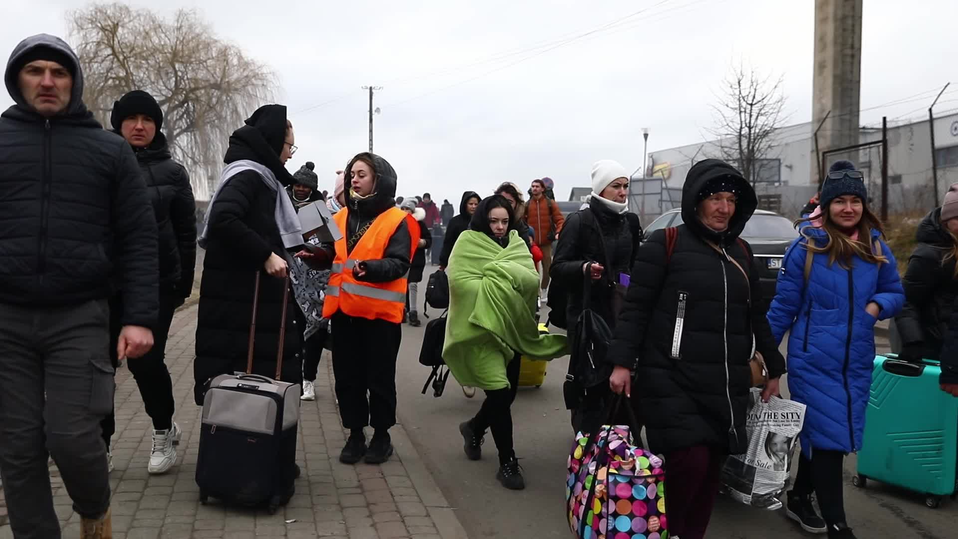People Cross Ukrainian-Polish Border After Fleeing Ukraine