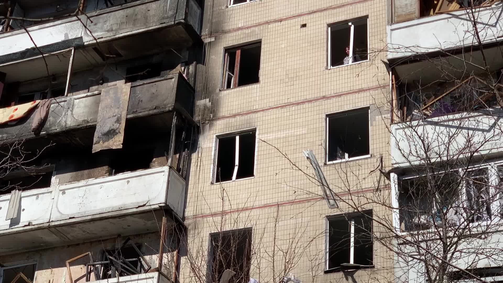 Damaged residential building in Kyiv hit by Russian shells