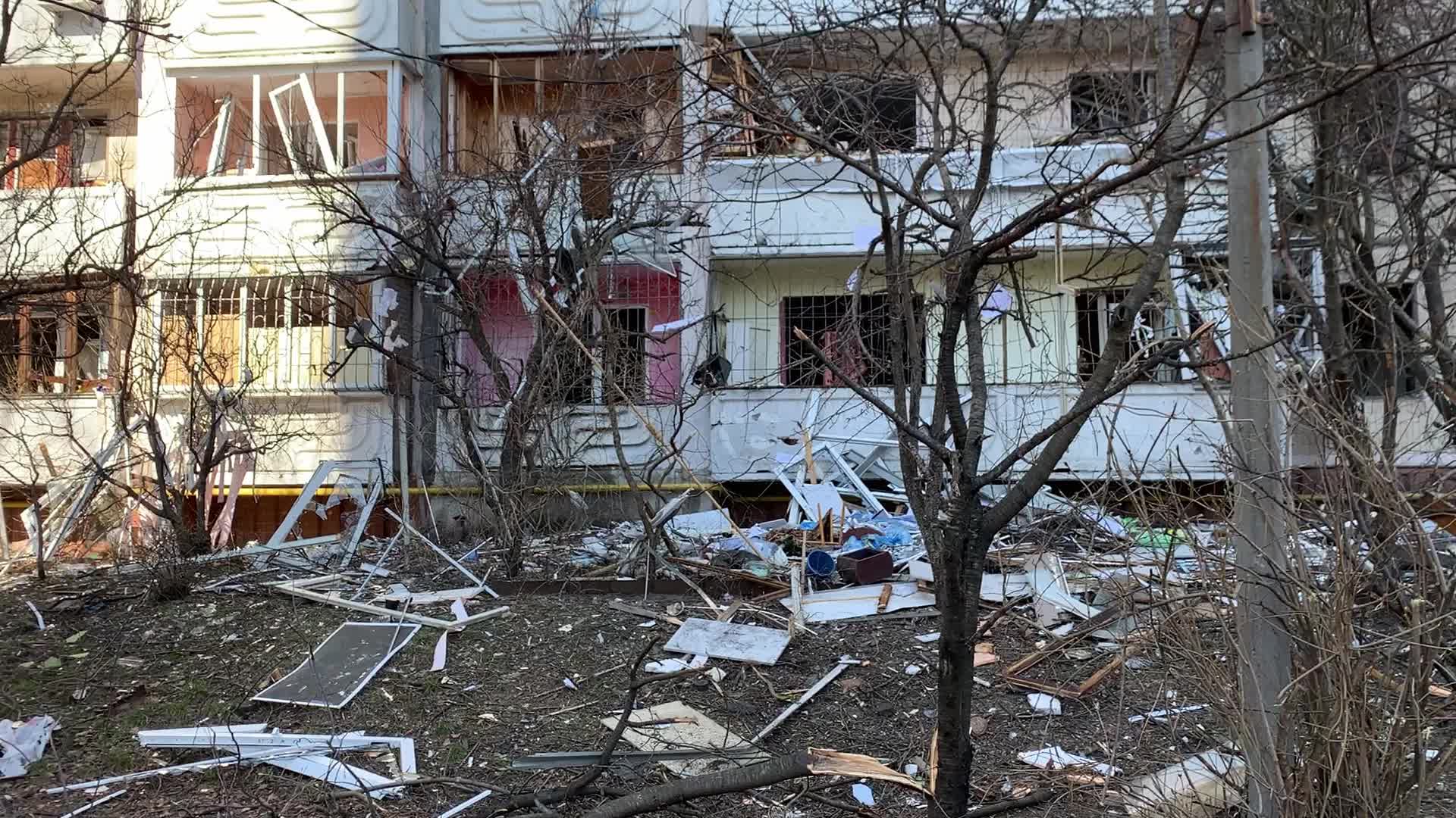 Damaged residential building in Kyiv hit by Russian shells