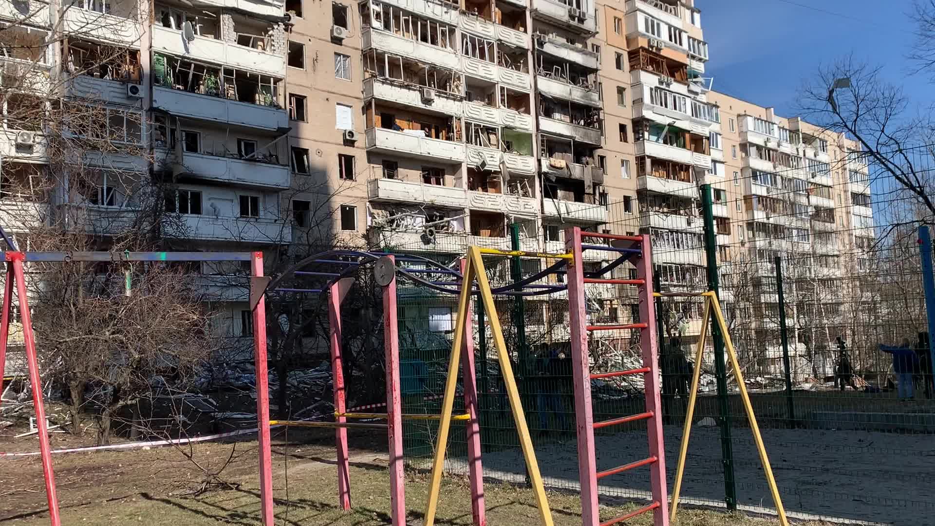 Damaged residential building in Kyiv hit by Russian shells