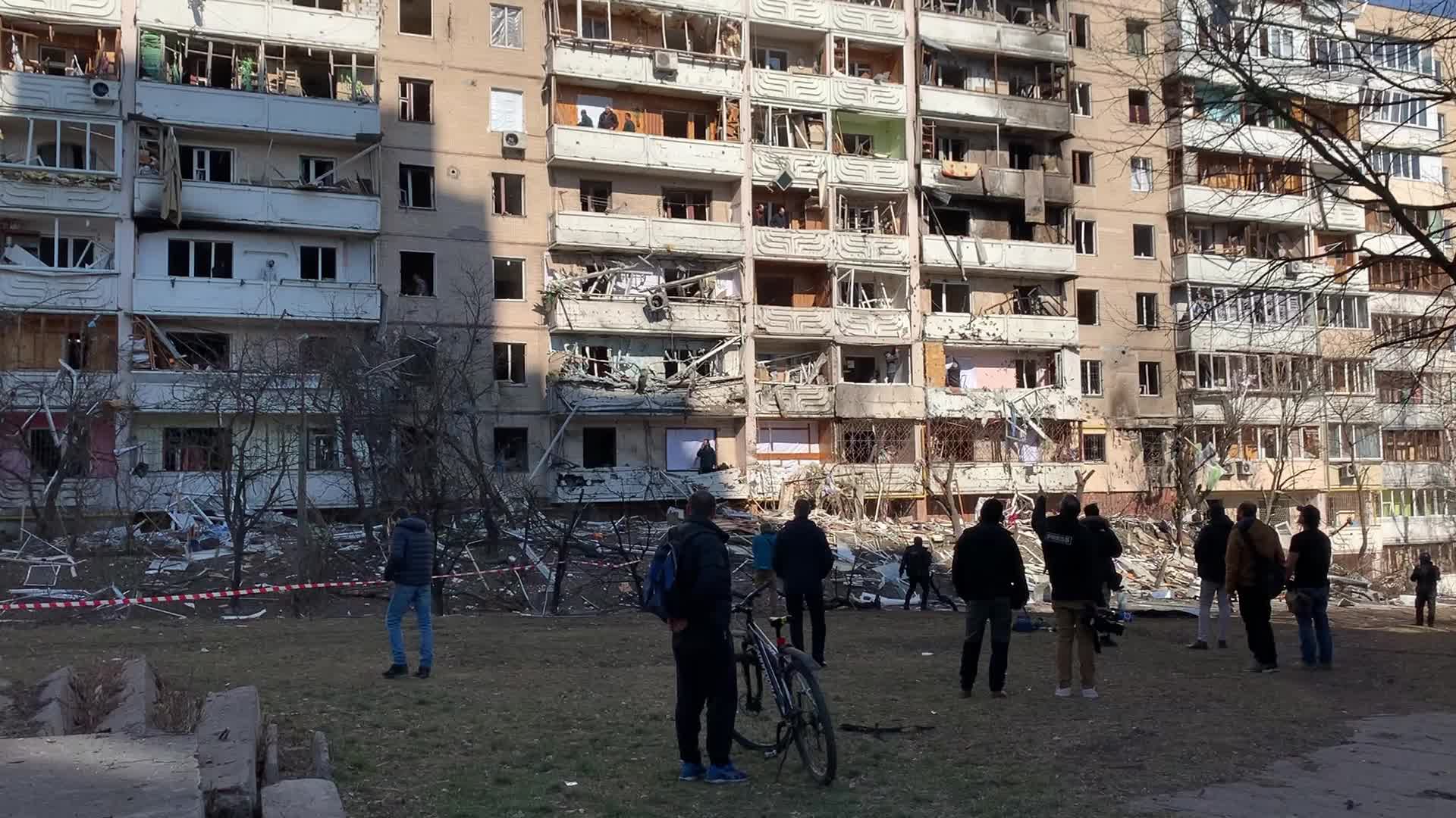 Damaged residential building in Kyiv hit by Russian shells