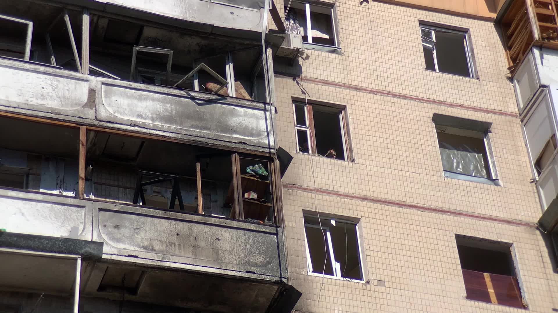 Damaged residential building in Kyiv hit by Russian shells