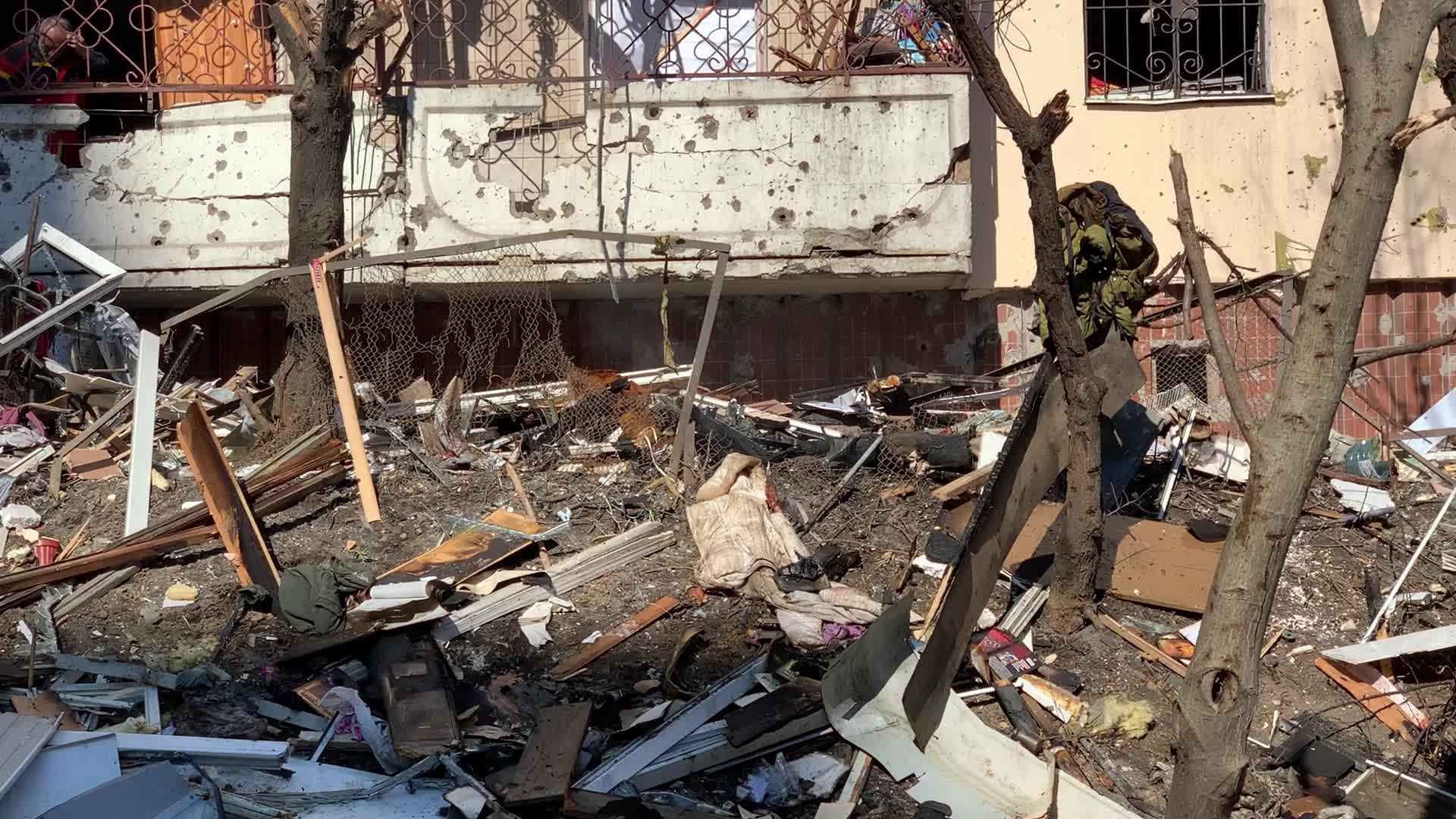 Damaged residential building in Kyiv hit by Russian shells