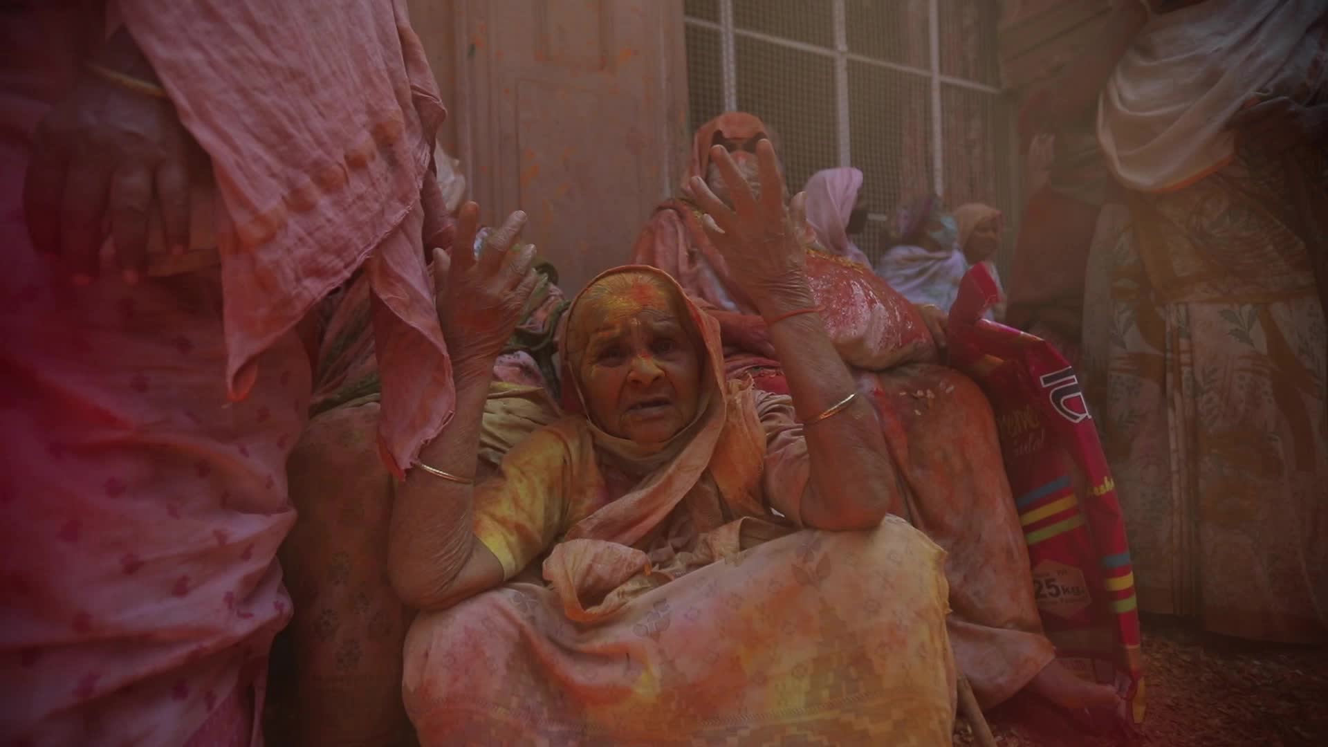 Indian widows celebrates Holi festival in India.