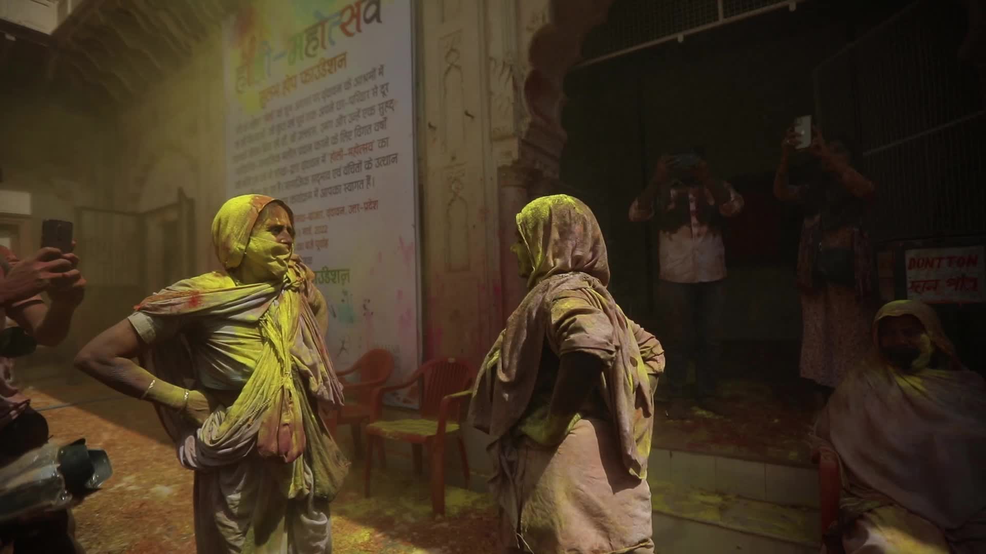 Indian widows celebrates Holi festival in India.