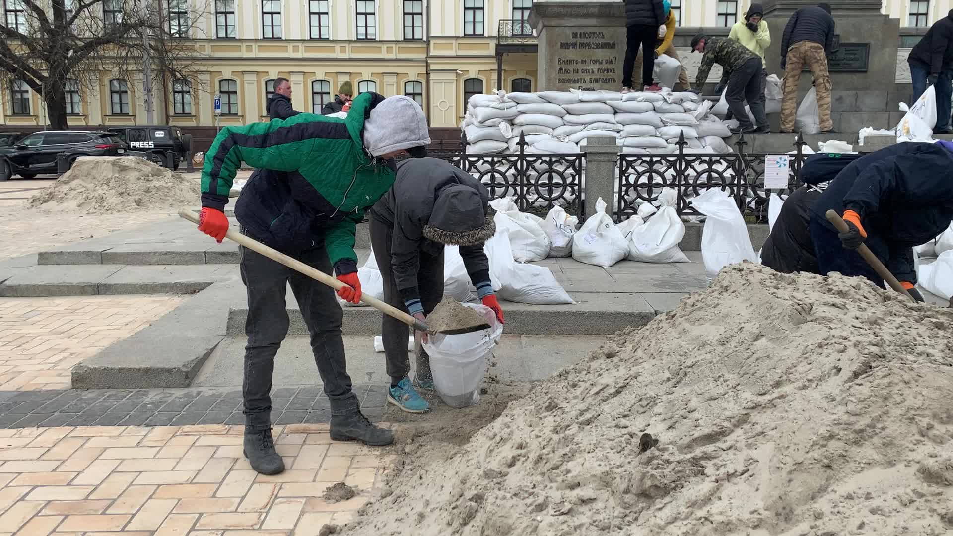 Communal workers protect a monuments in center of Kyiv as Russia's invasion of Ukraine continues