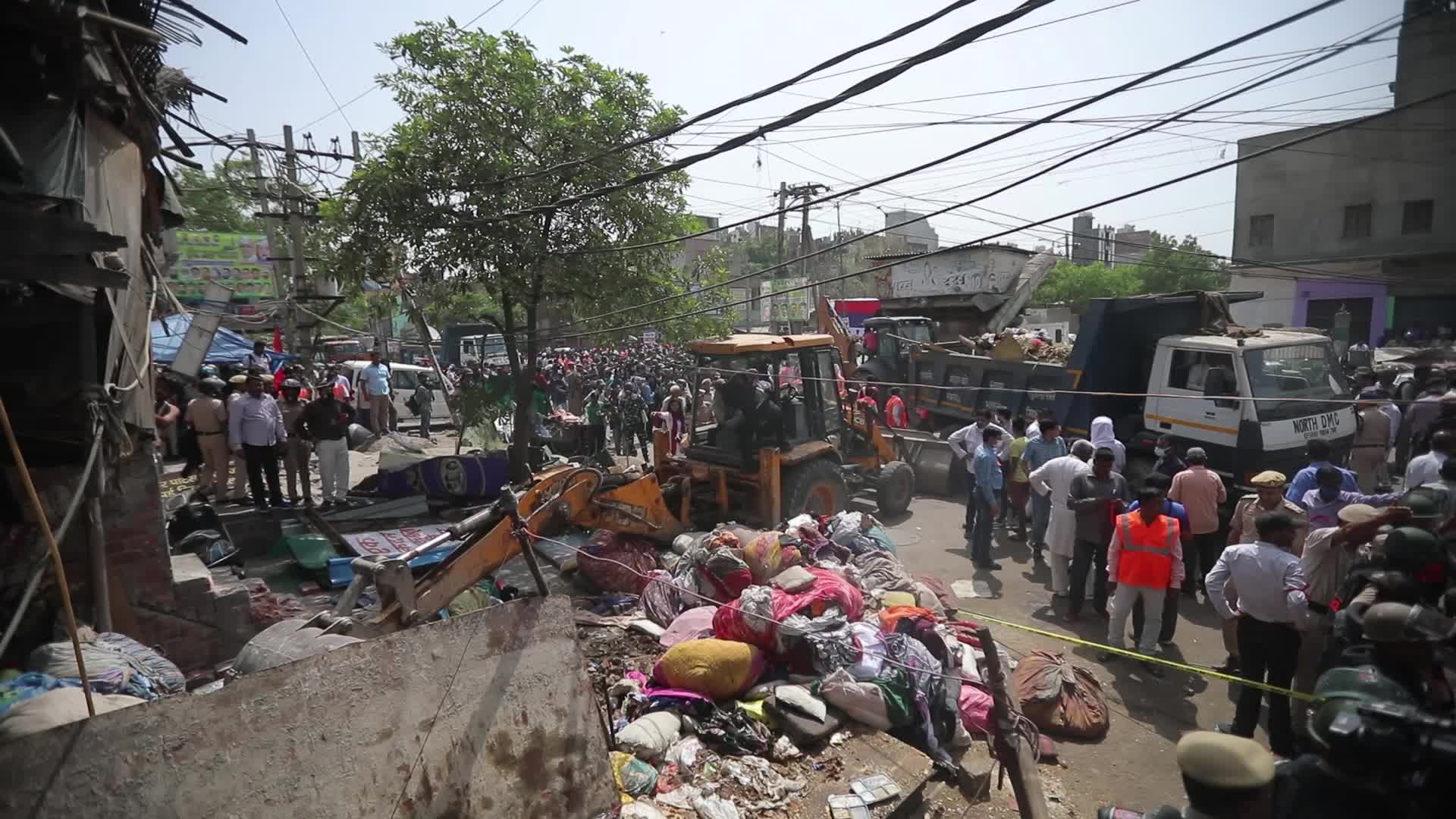 Demolition drive at the site of communal violence in New Delhi.