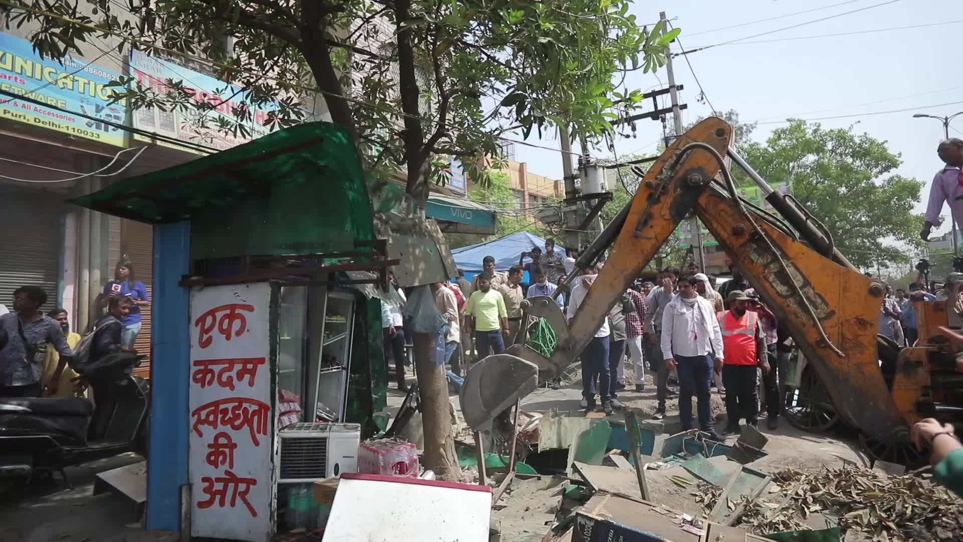 Demolition drive at the site of communal violence in New Delhi.
