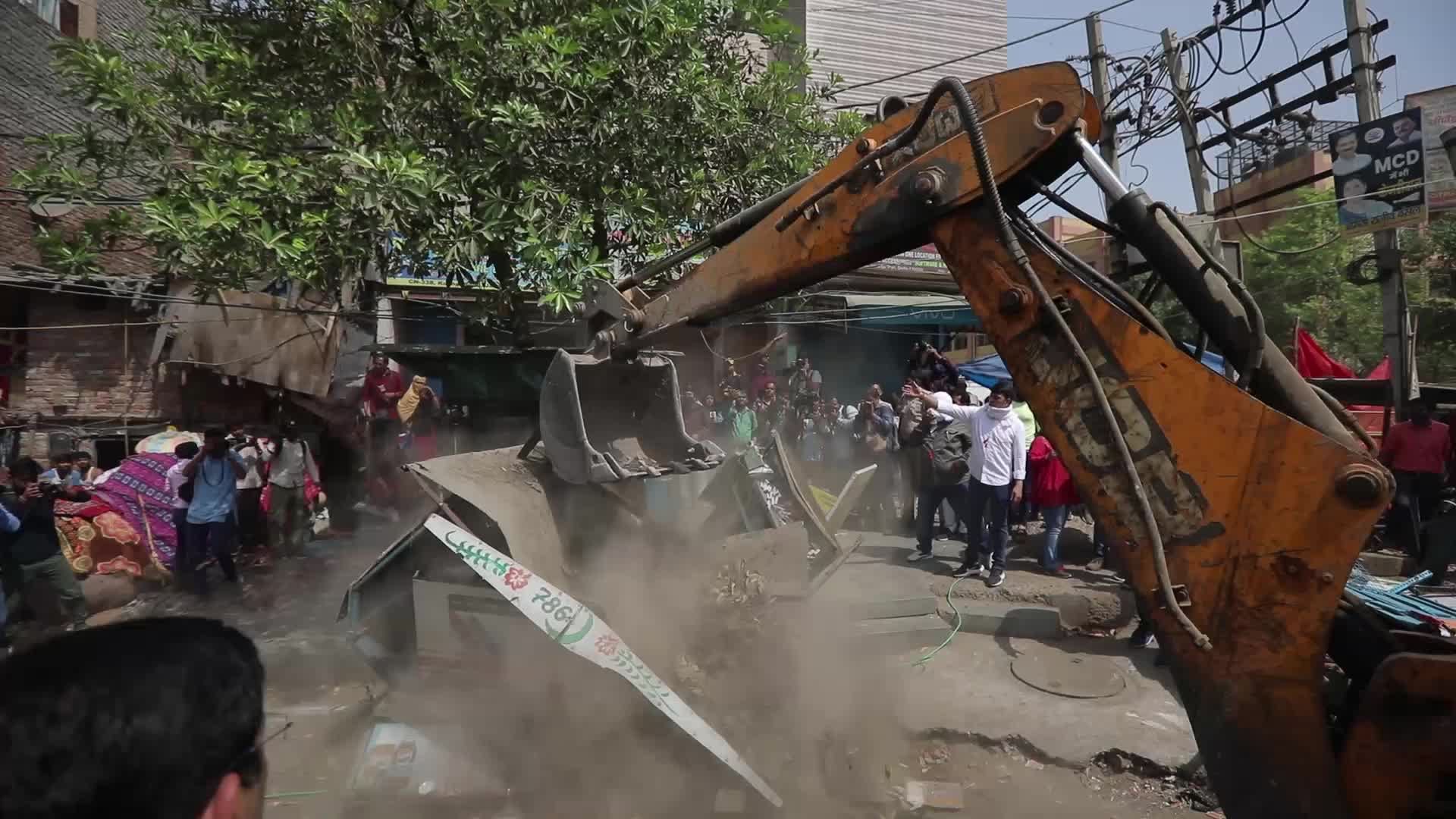 Demolition drive at the site of communal violence in New Delhi.