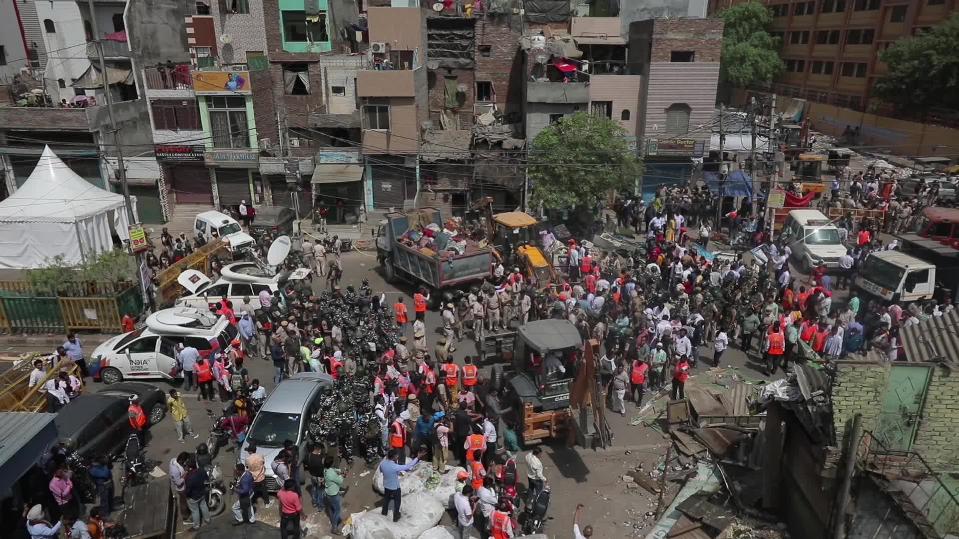 Demolition drive at the site of communal violence in New Delhi.