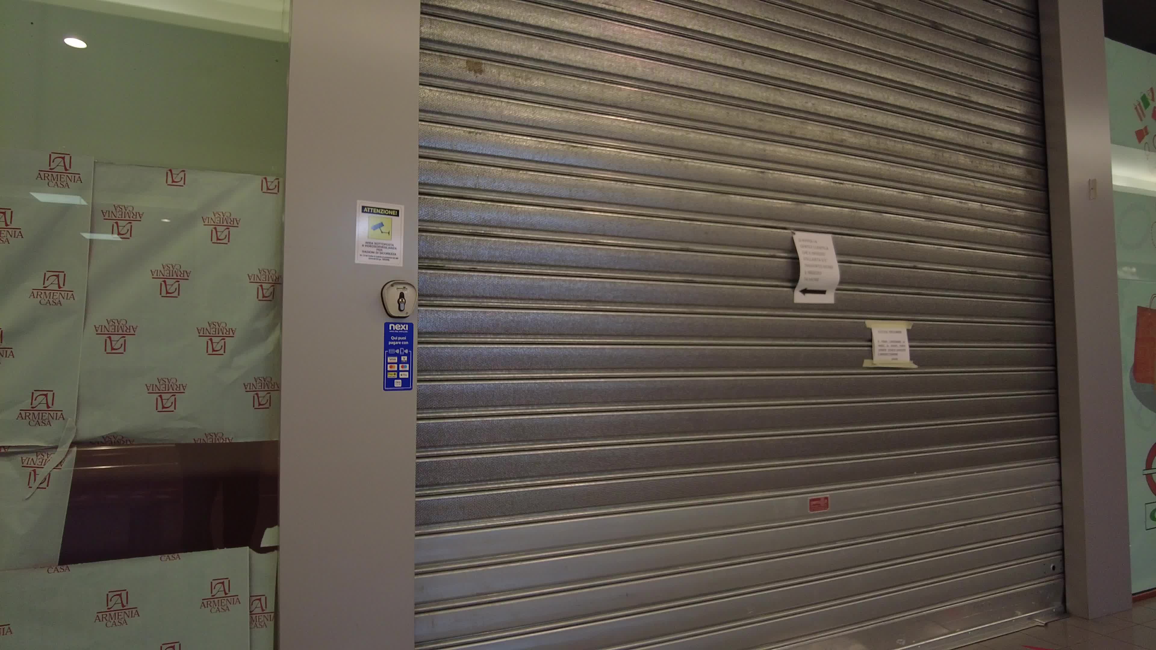 Closed stores in a shopping centre in Italy