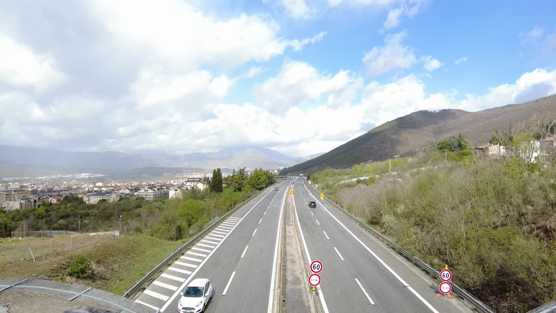 Vehicles driving on A24 motorway in Italy