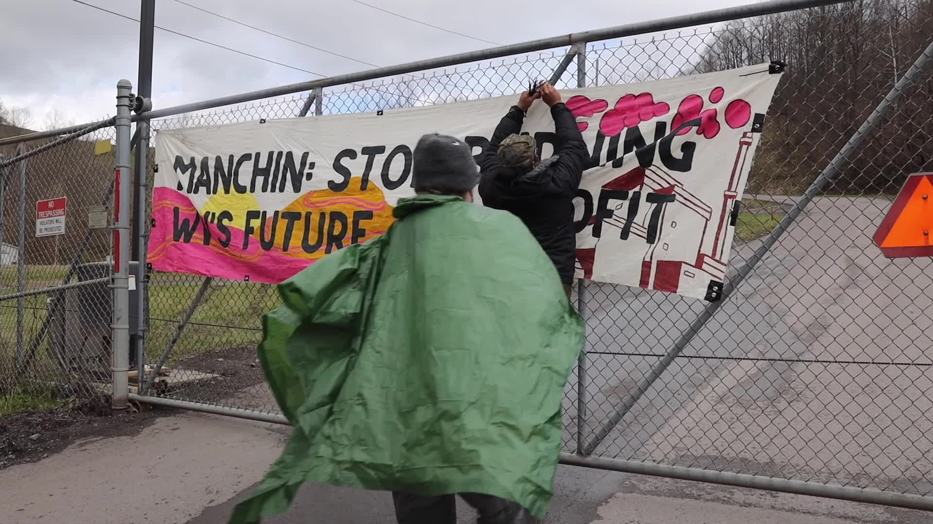 Climate protestors block West Virginia coal power plant