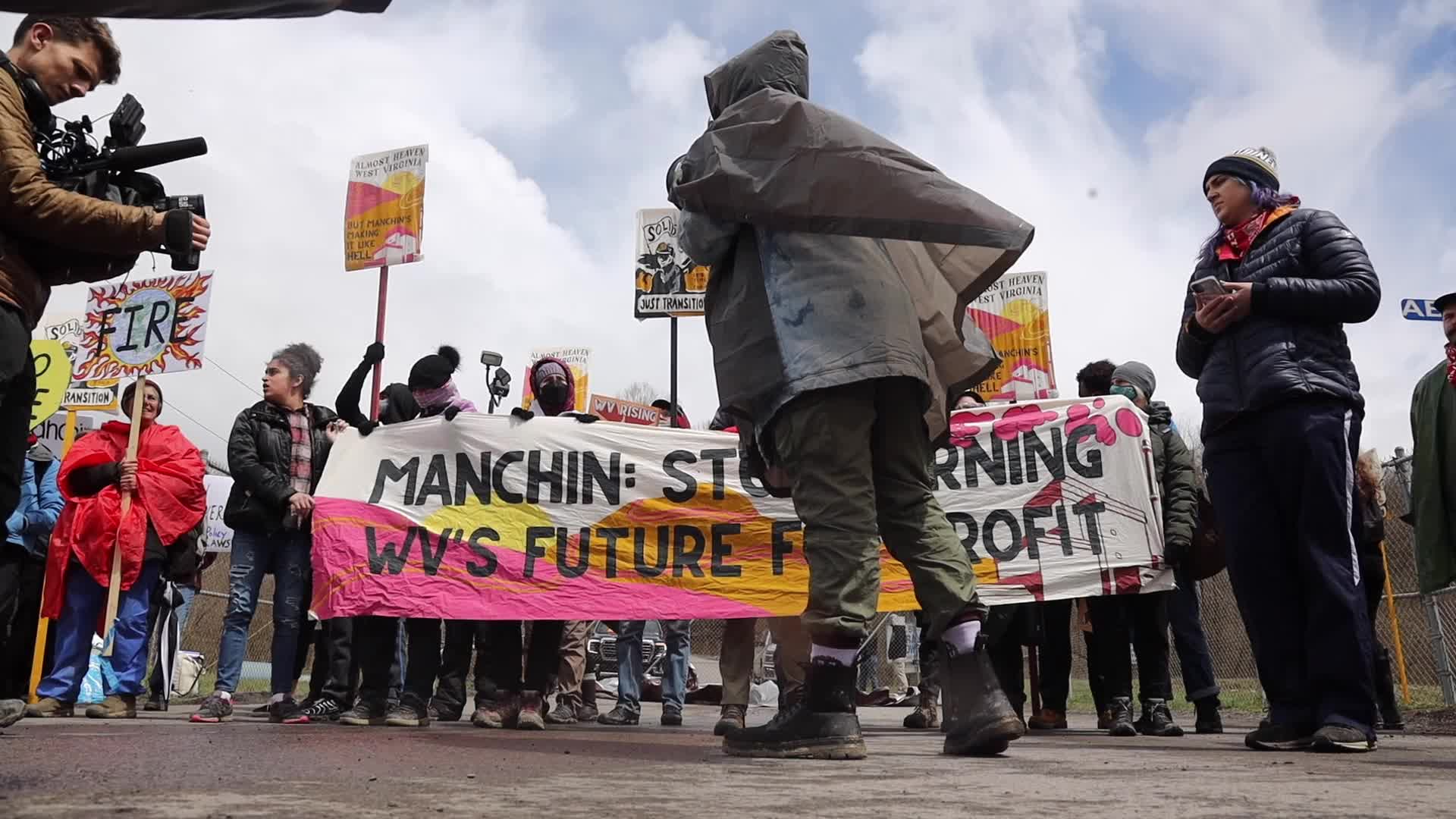 Climate protestors block West Virginia coal power plant
