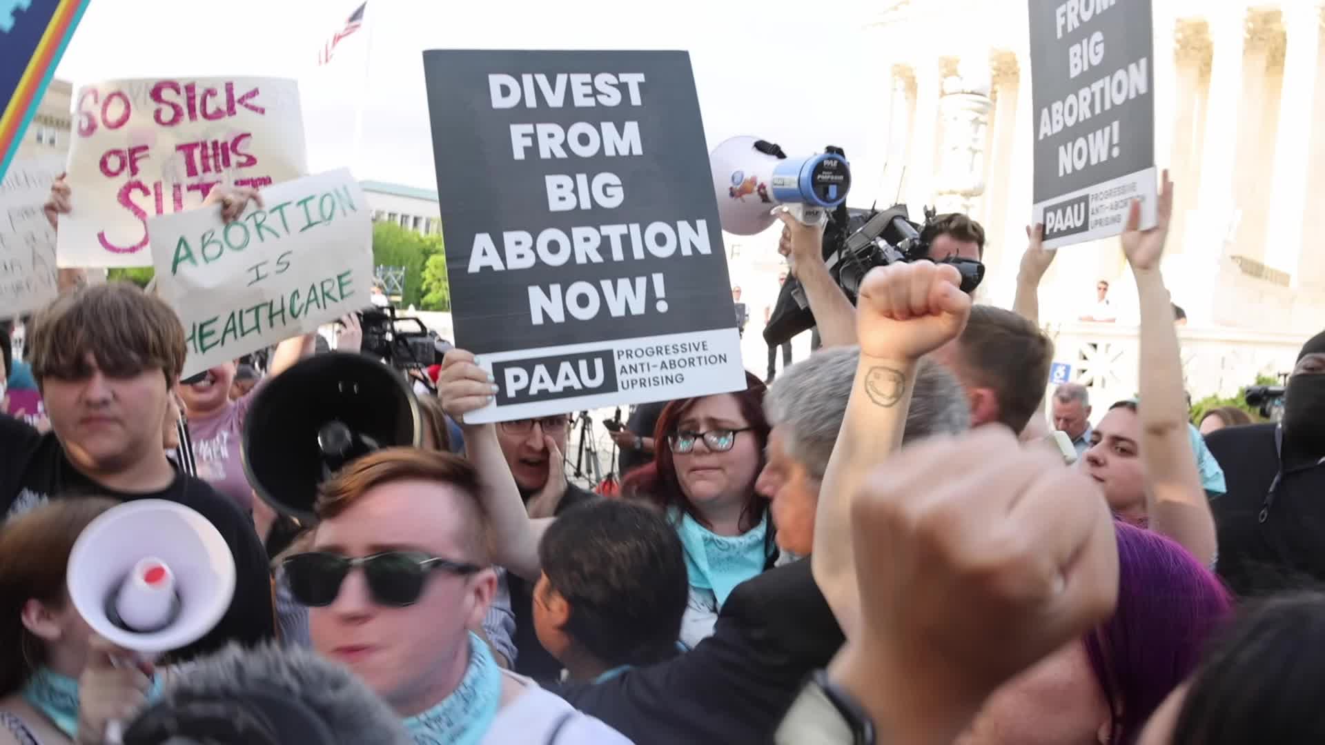 Opposing groups demonstrate outside Supreme Court following opinion leak