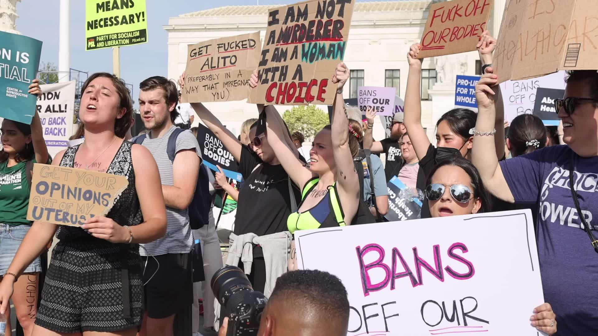 Opposing groups demonstrate outside Supreme Court following opinion leak