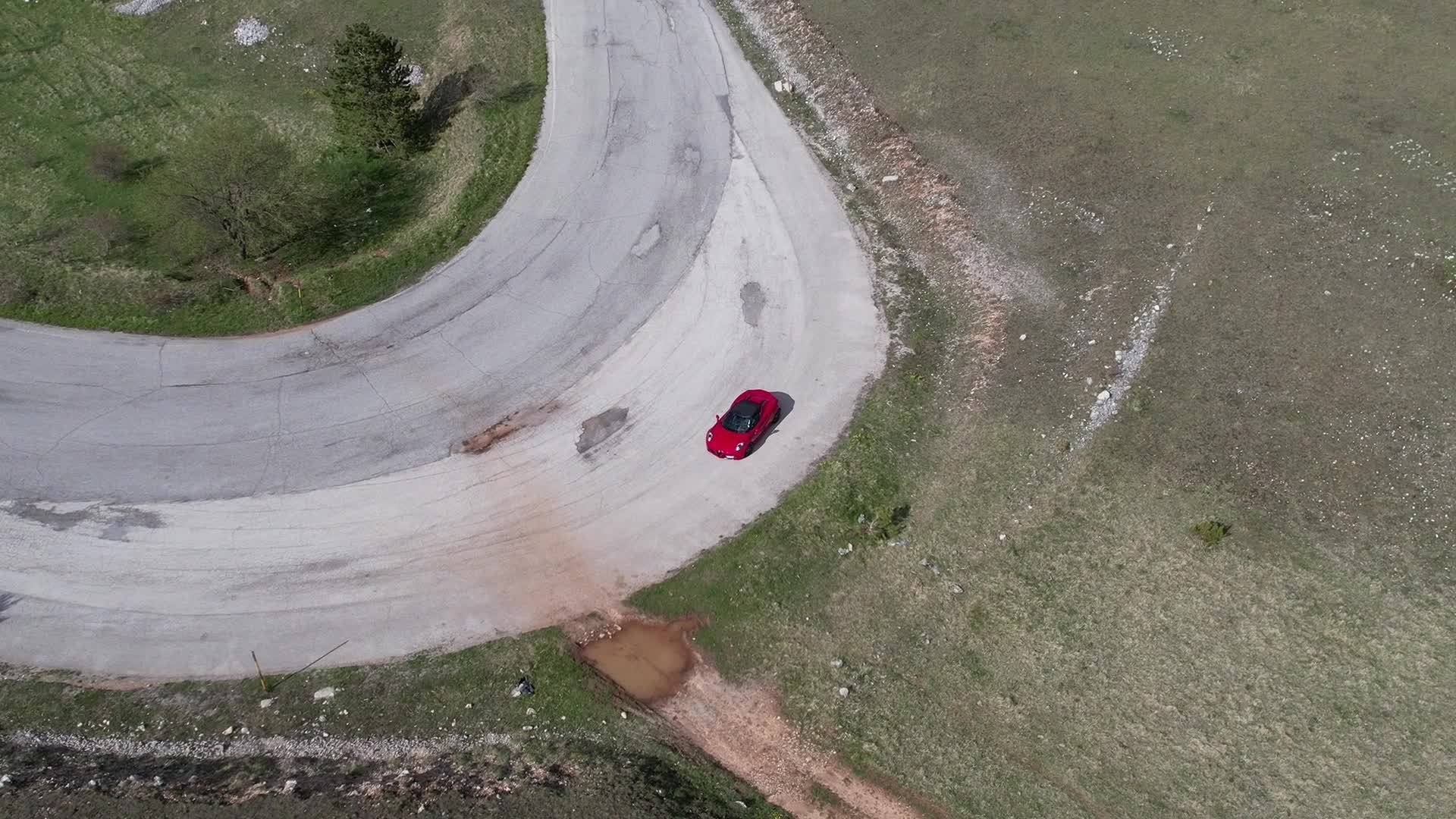 An Alfa Romeo 4C On The Roads Of Apennine Mountains
