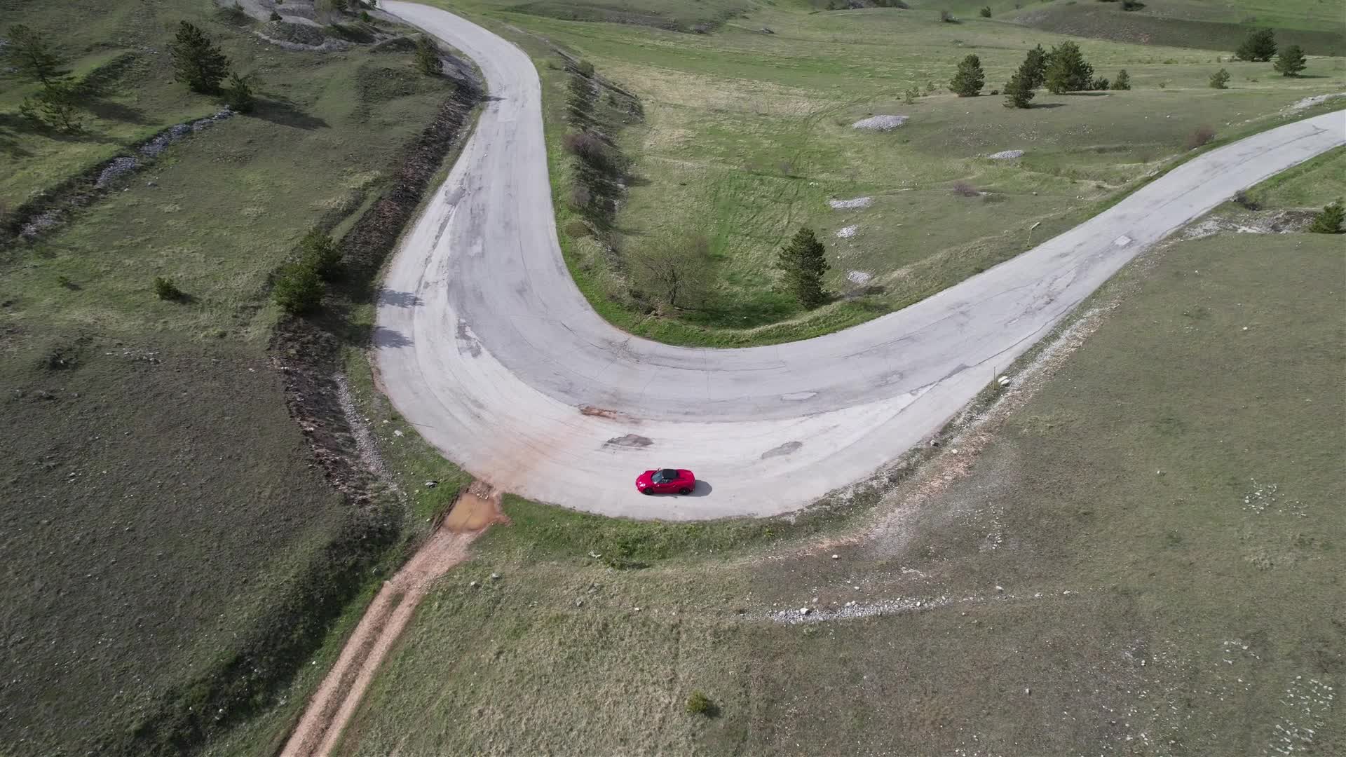 An Alfa Romeo 4C On The Roads Of Apennine Mountains