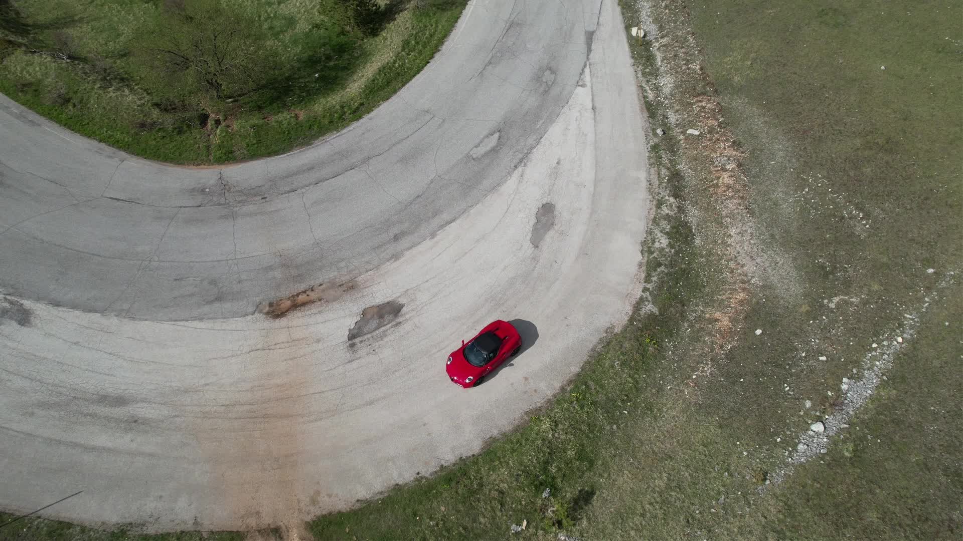An Alfa Romeo 4C On The Roads Of Apennine Mountains