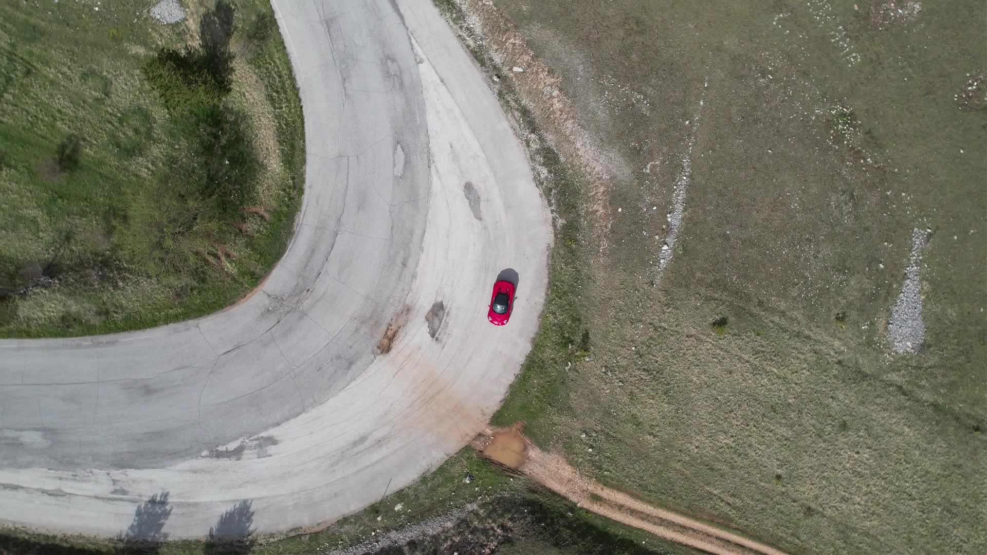 An Alfa Romeo 4C On The Roads Of Apennine Mountains