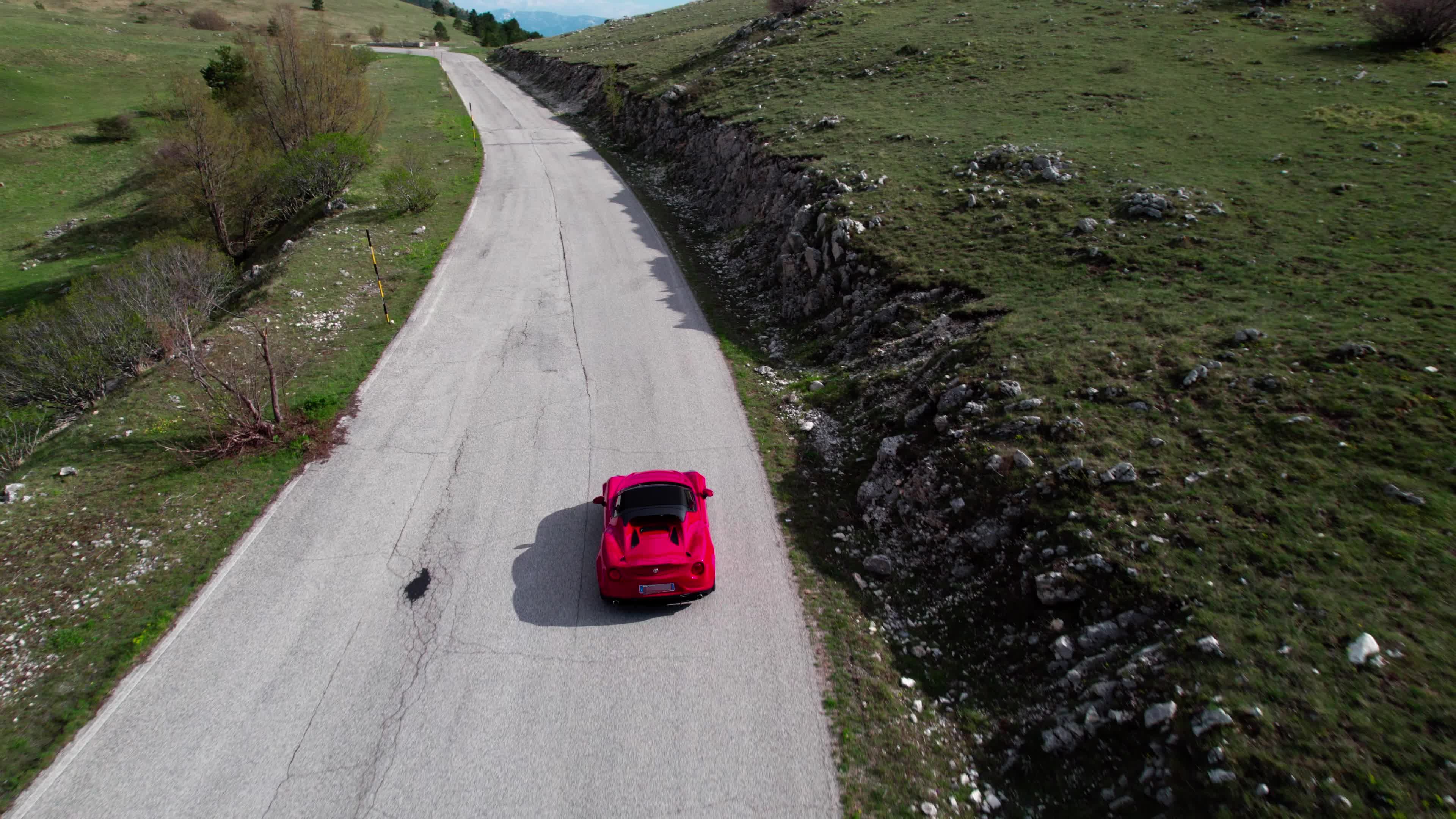 An Alfa Romeo 4C On The Roads Of Apennine Mountains