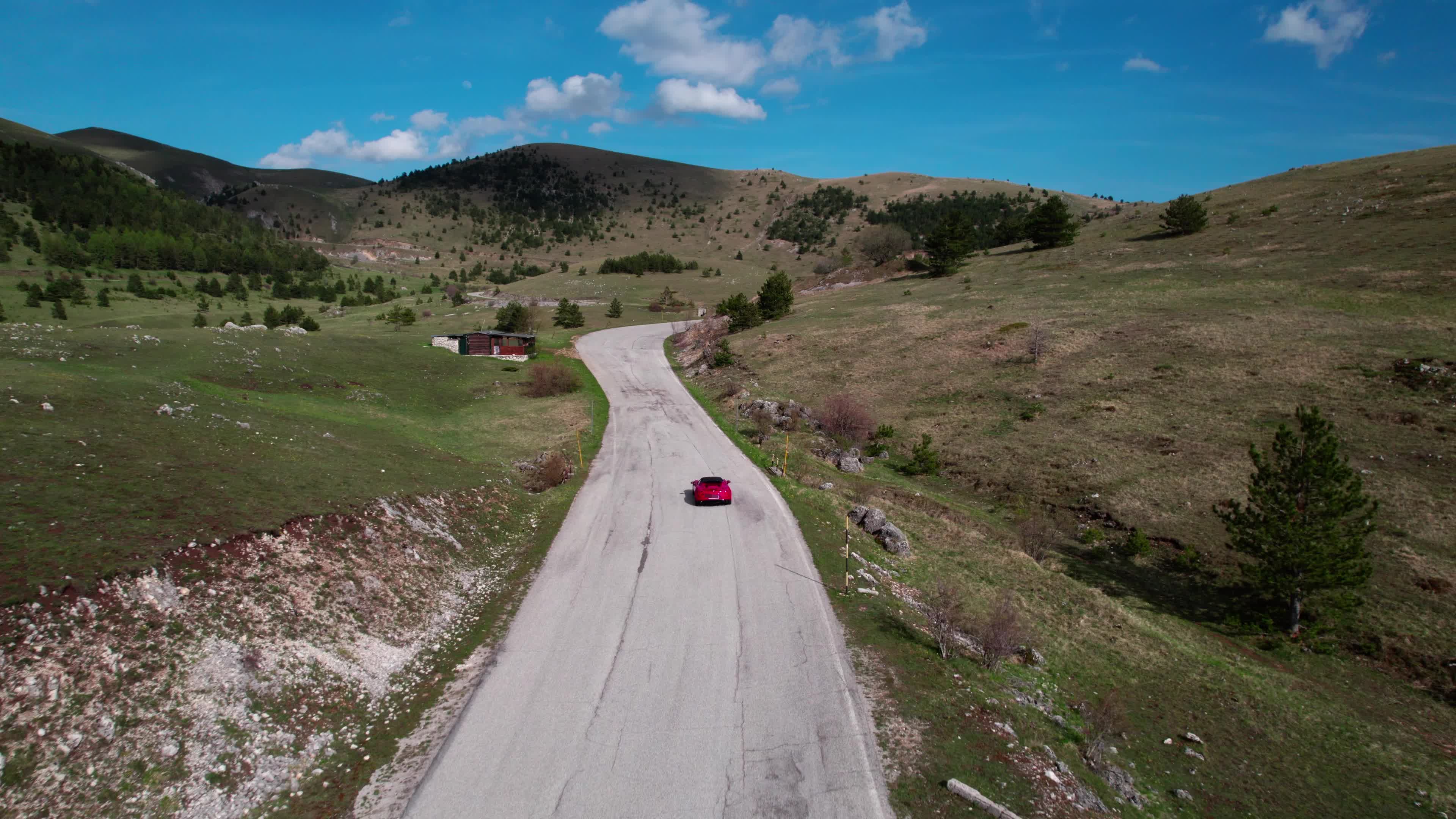 An Alfa Romeo 4C On The Roads Of Apennine Mountains
