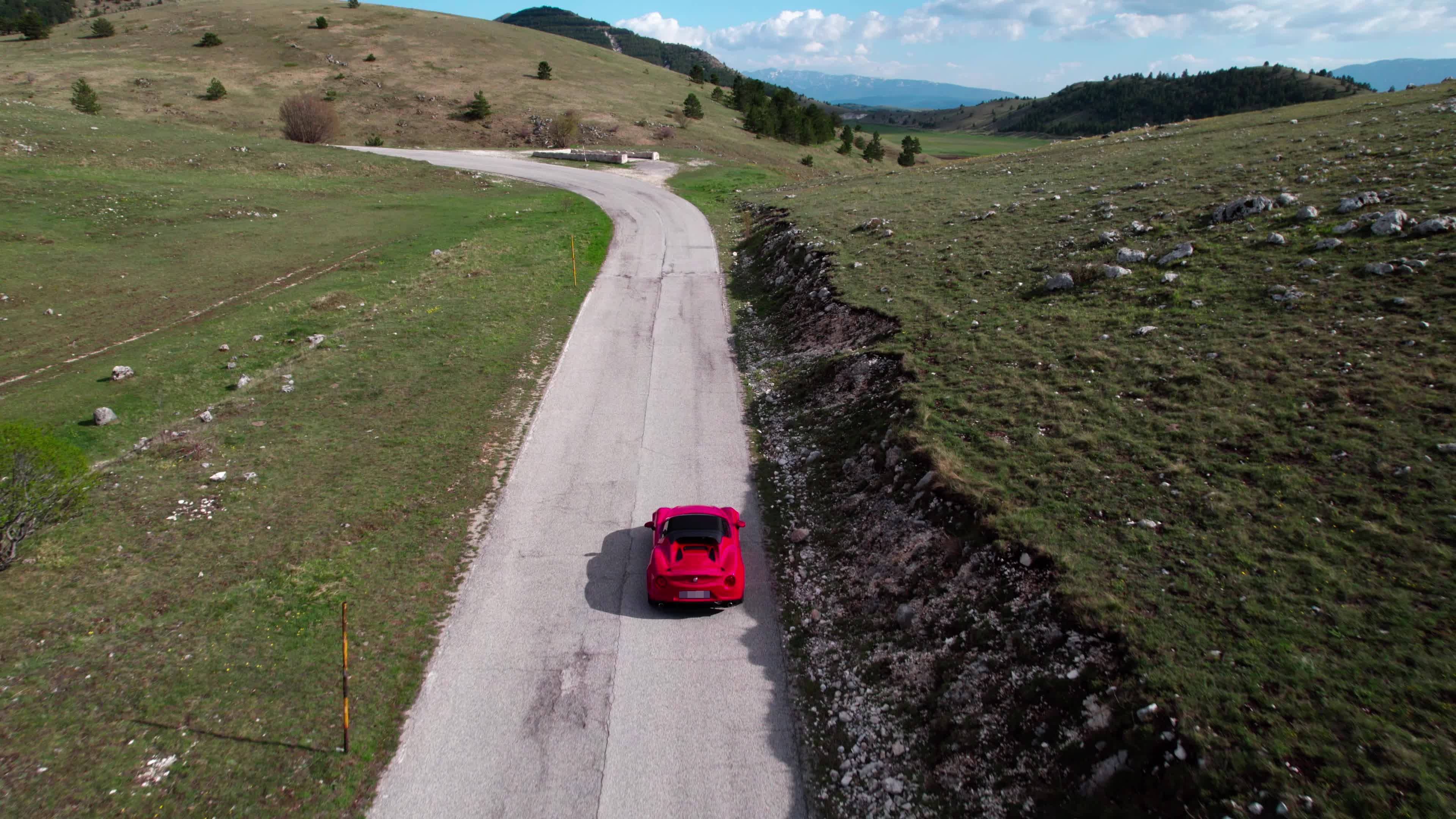 An Alfa Romeo 4C On The Roads Of Apennine Mountains