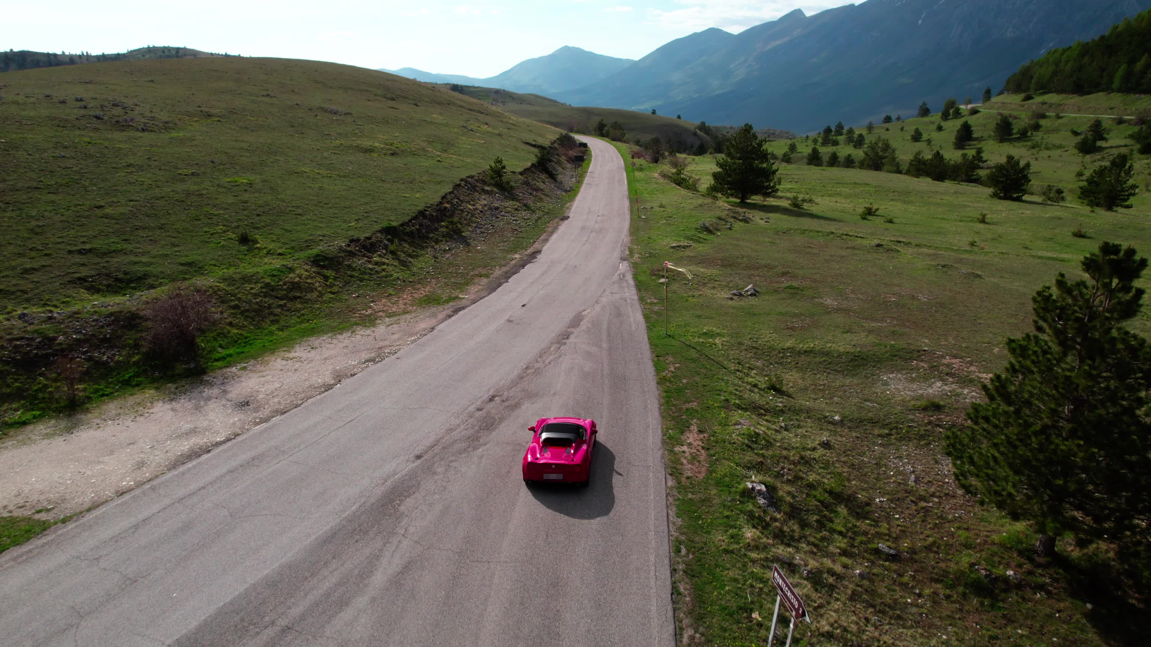 An Alfa Romeo 4C On The Roads Of Apennine Mountains