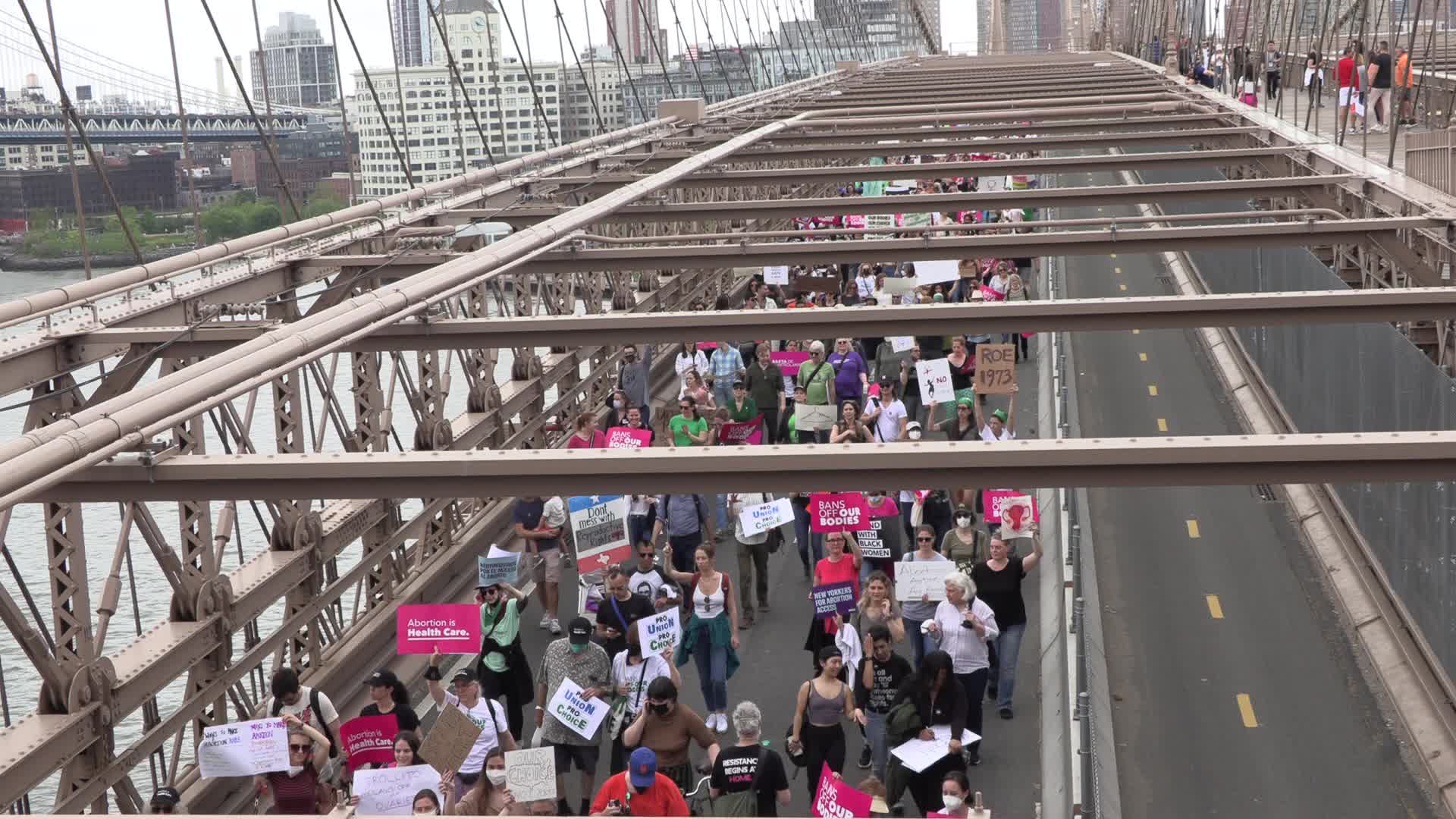 NYC: Abortion right’s activists march across Brooklyn Bridge