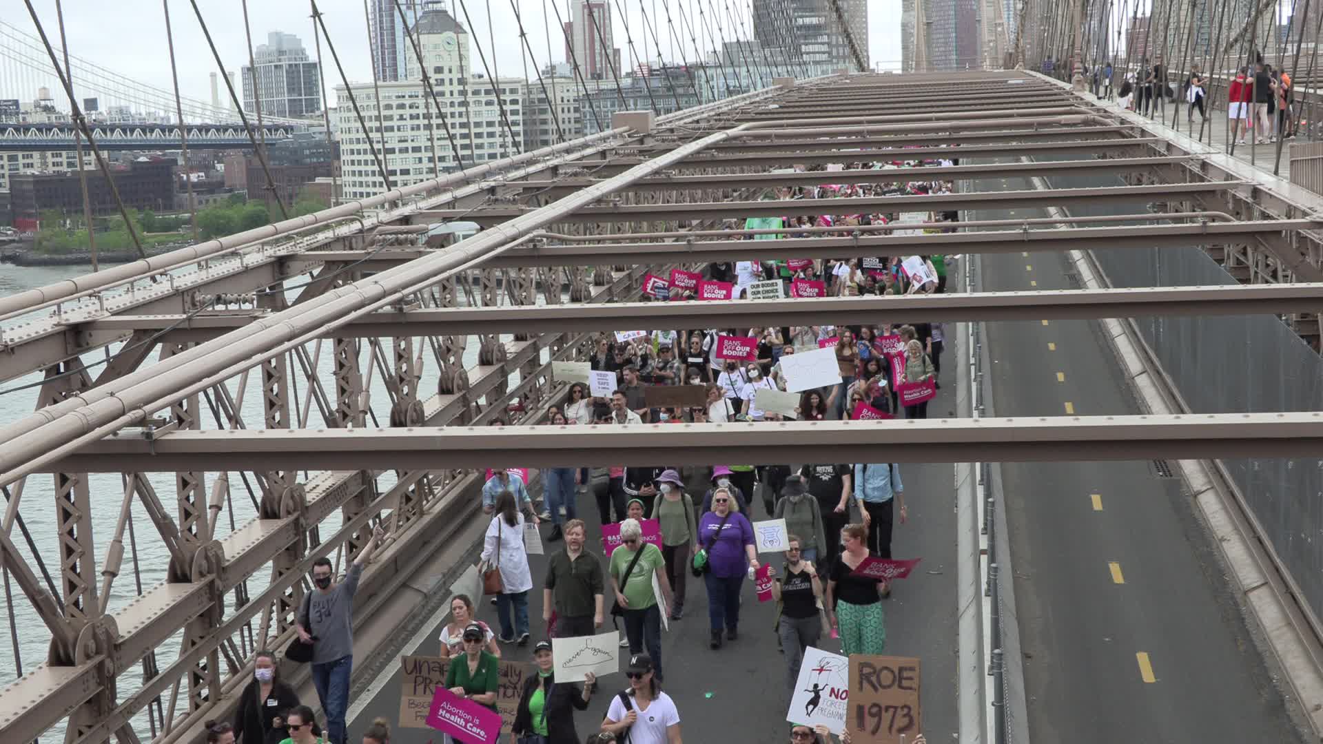 NYC: Abortion right’s activists march across Brooklyn Bridge