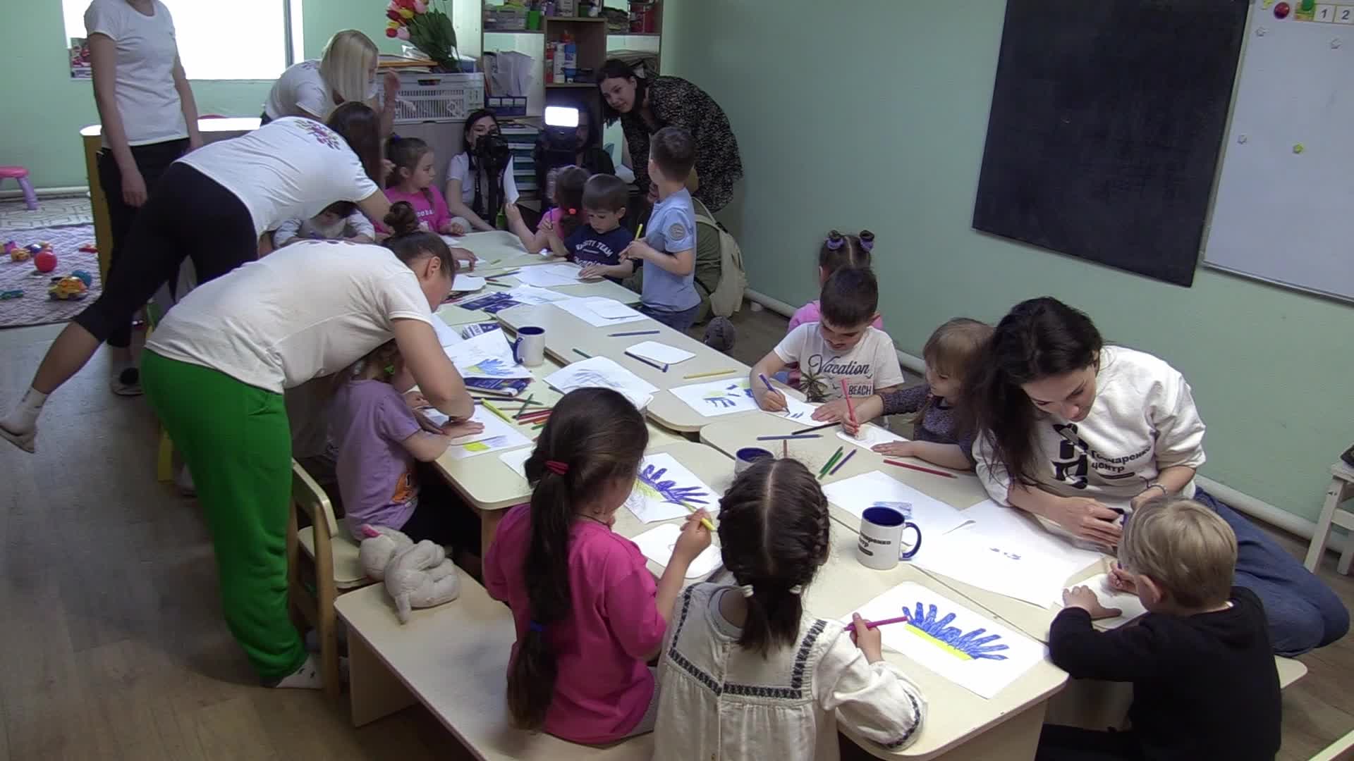 Ukrainian displaced children draw pictures to make chevrons for Ukrainian soldiers in Odesa, amid Russian invasion in Ukraine