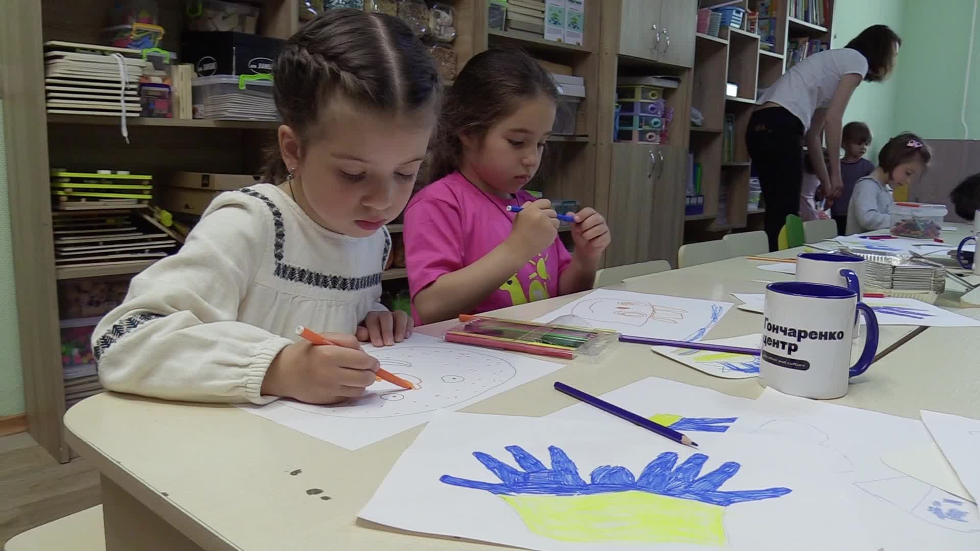 Ukrainian displaced children draw pictures to make chevrons for Ukrainian soldiers in Odesa, amid Russian invasion in Ukraine