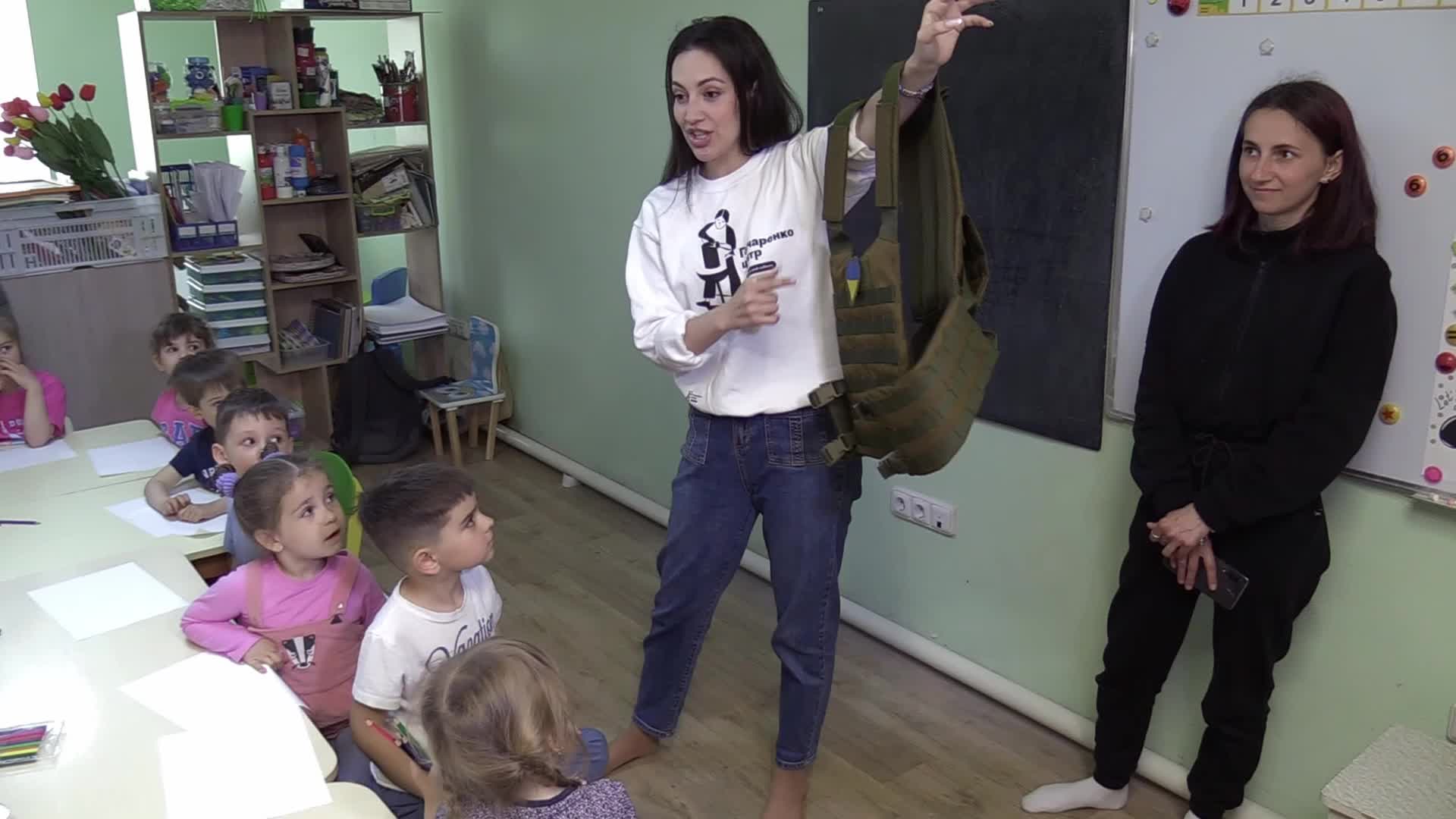 Ukrainian displaced children draw pictures to make chevrons for Ukrainian soldiers in Odesa, amid Russian invasion in Ukraine