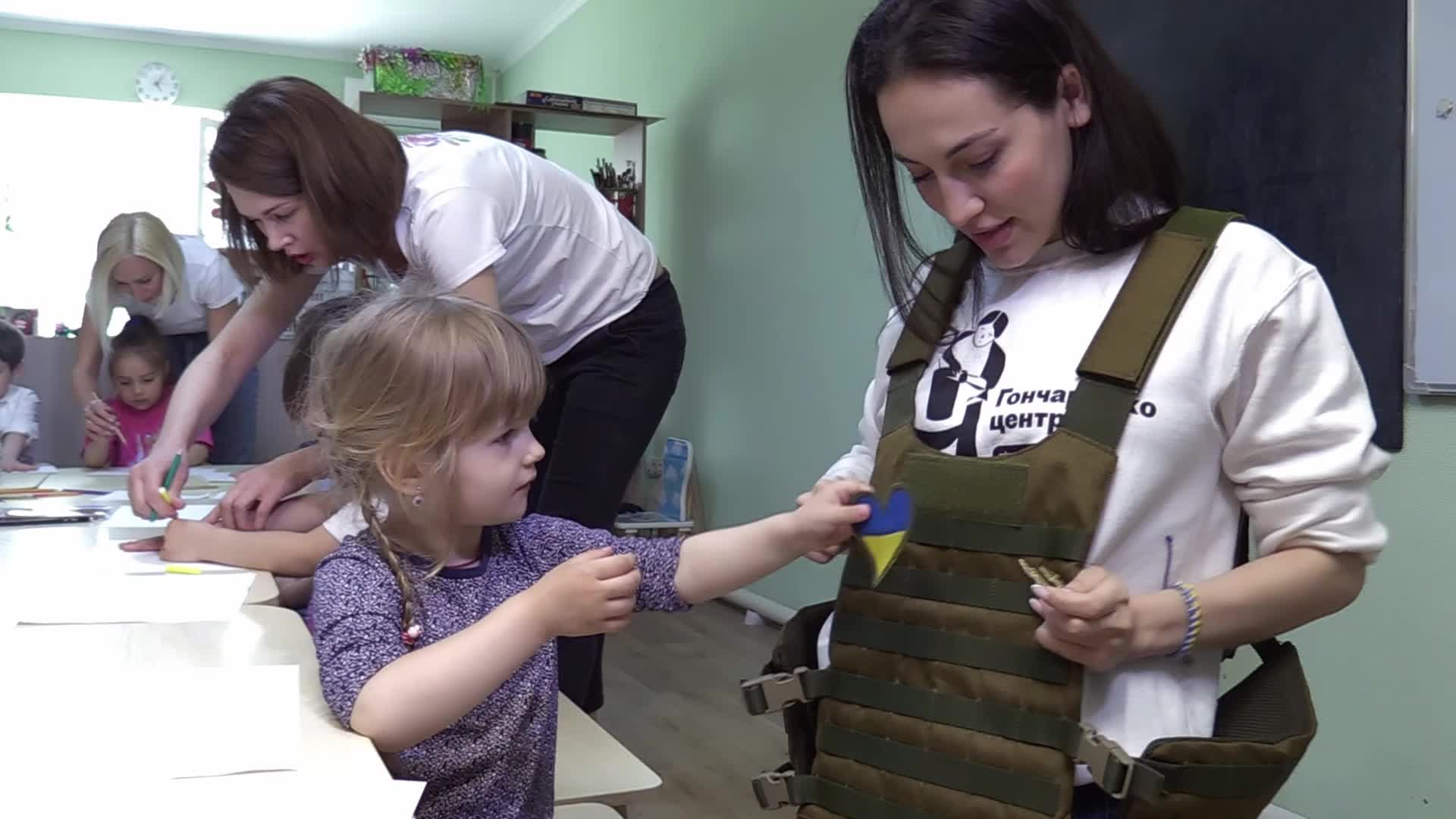 Ukrainian displaced children draw pictures to make chevrons for Ukrainian soldiers in Odesa, amid Russian invasion in Ukraine