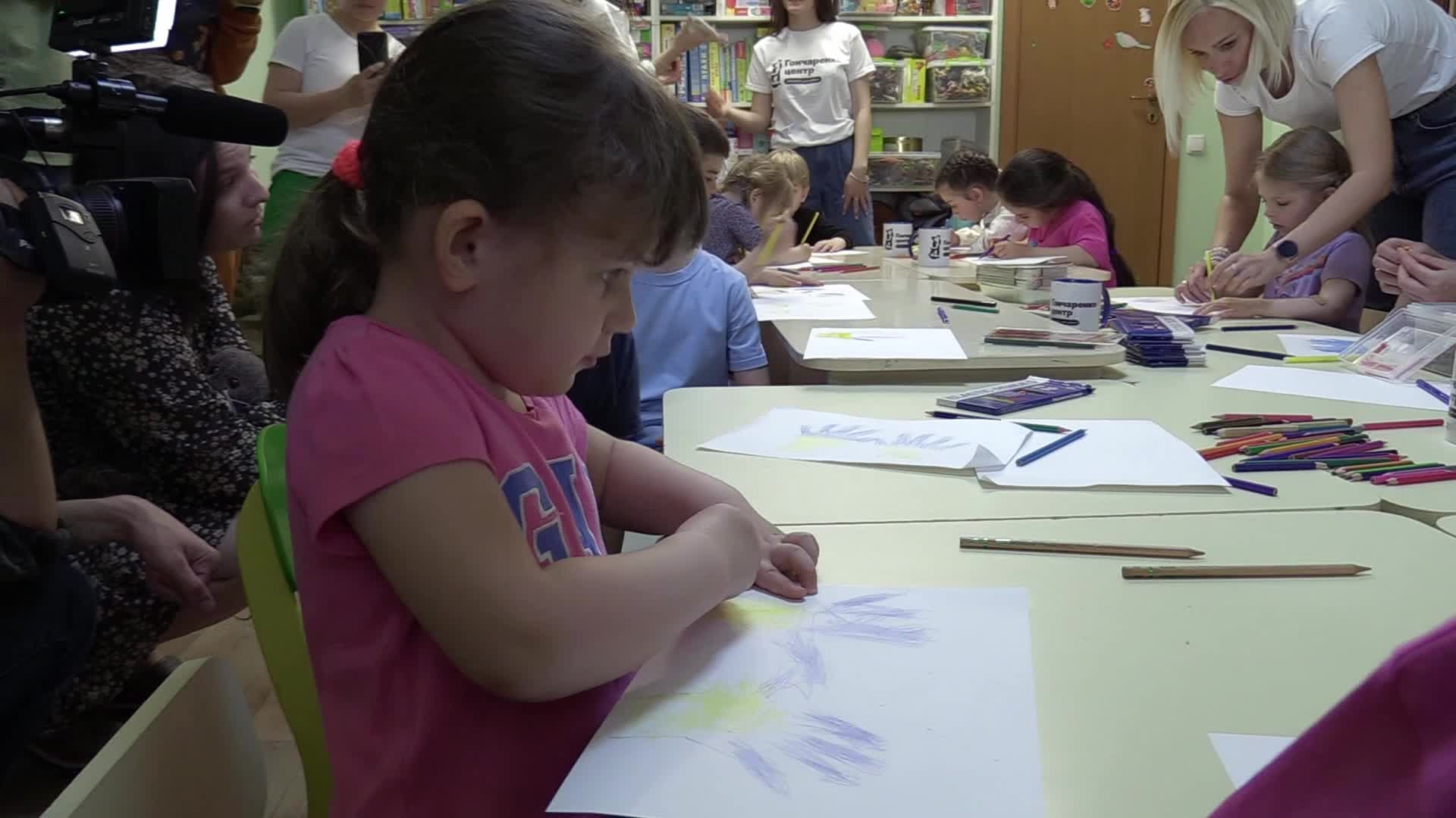 Ukrainian displaced children draw pictures to make chevrons for Ukrainian soldiers in Odesa, amid Russian invasion in Ukraine
