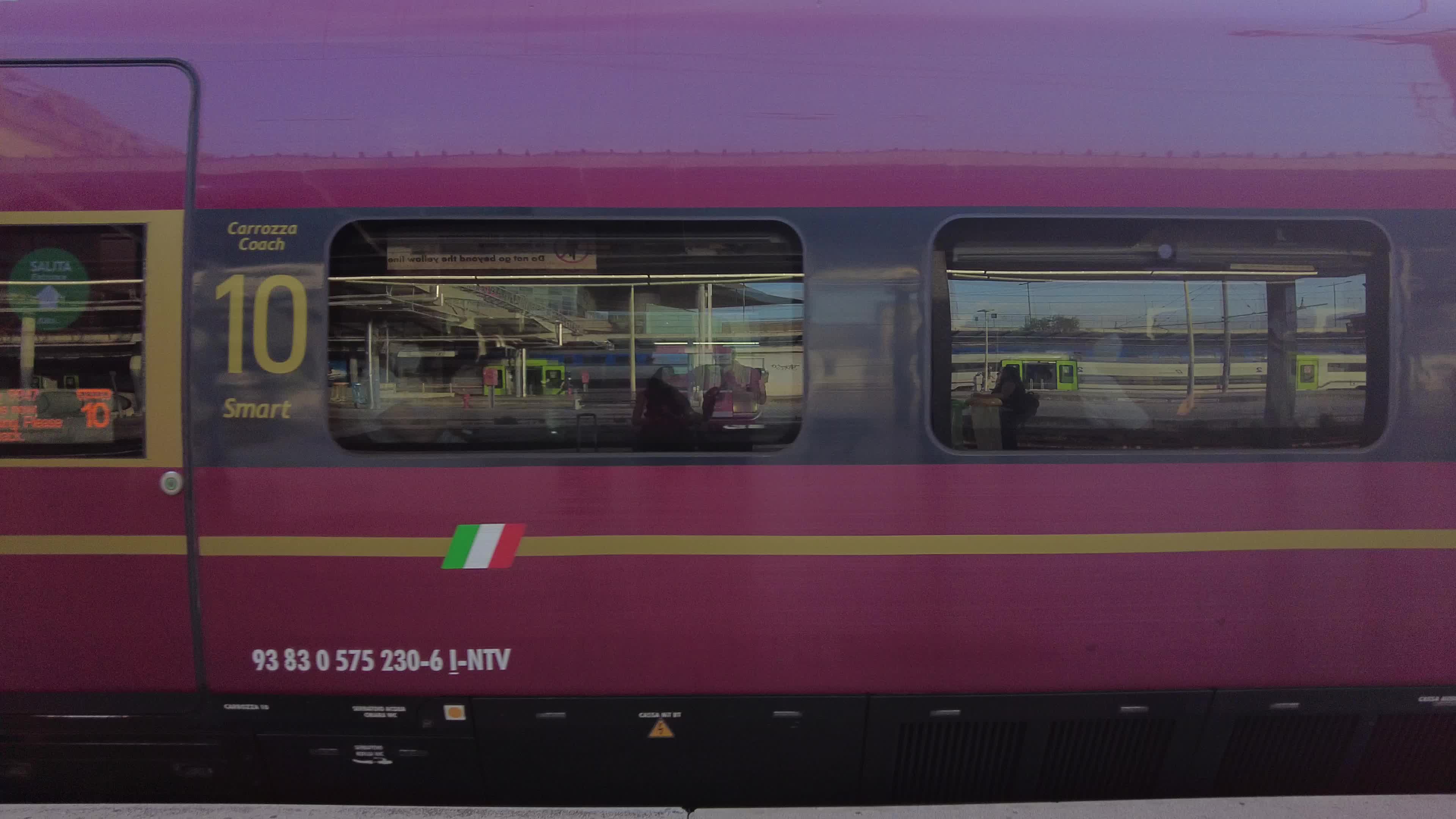 People and travelers in Tiburtina train station in Rome, Italy